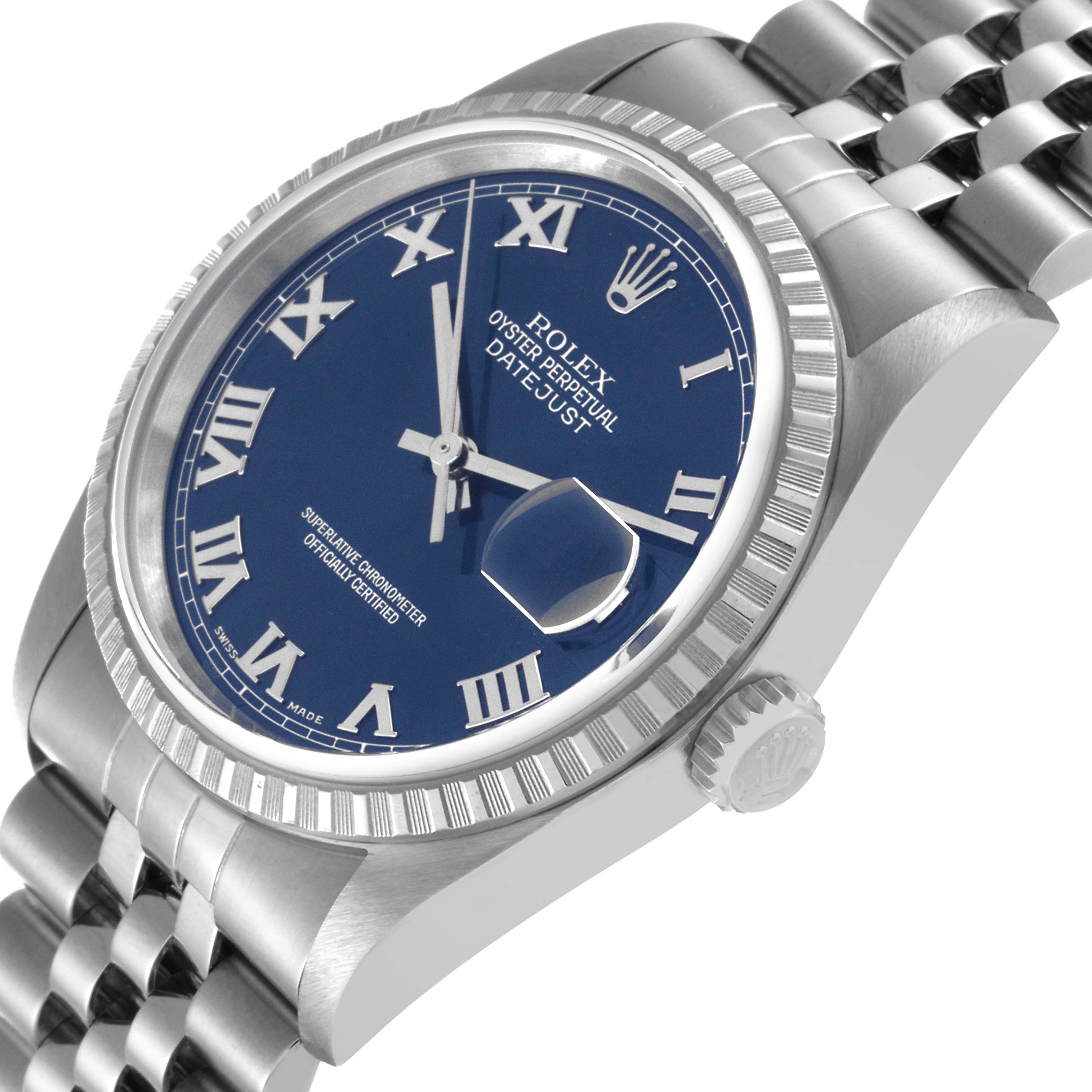 The image shows a close-up of a Rolex Datejust 16220 Men's Stainless Steel Blue Dial 16220 Men's Stainless Steel Blue Dial watch at a slight angle, highlighting its blue Roman numeral dial, fluted bezel, and Jubilee bracelet.