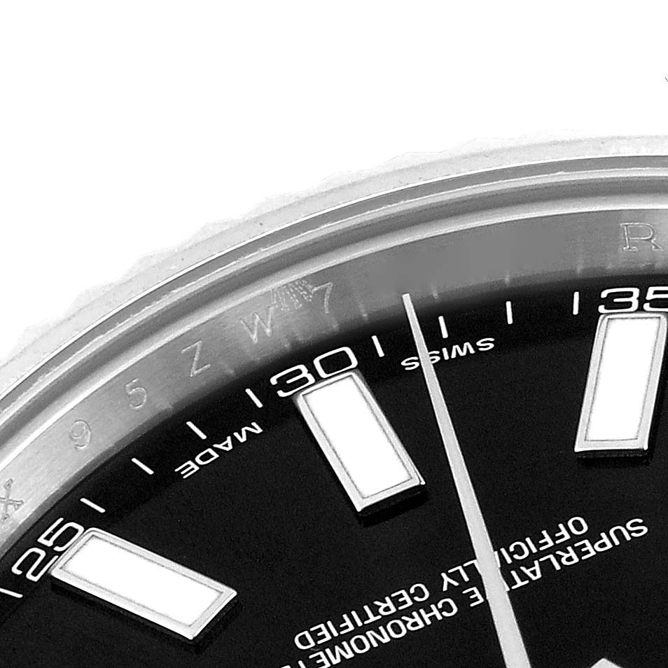 This close-up image shows the watch face and markers of the Datejust 41 model by Rolex, focusing on the minute and hour markers.