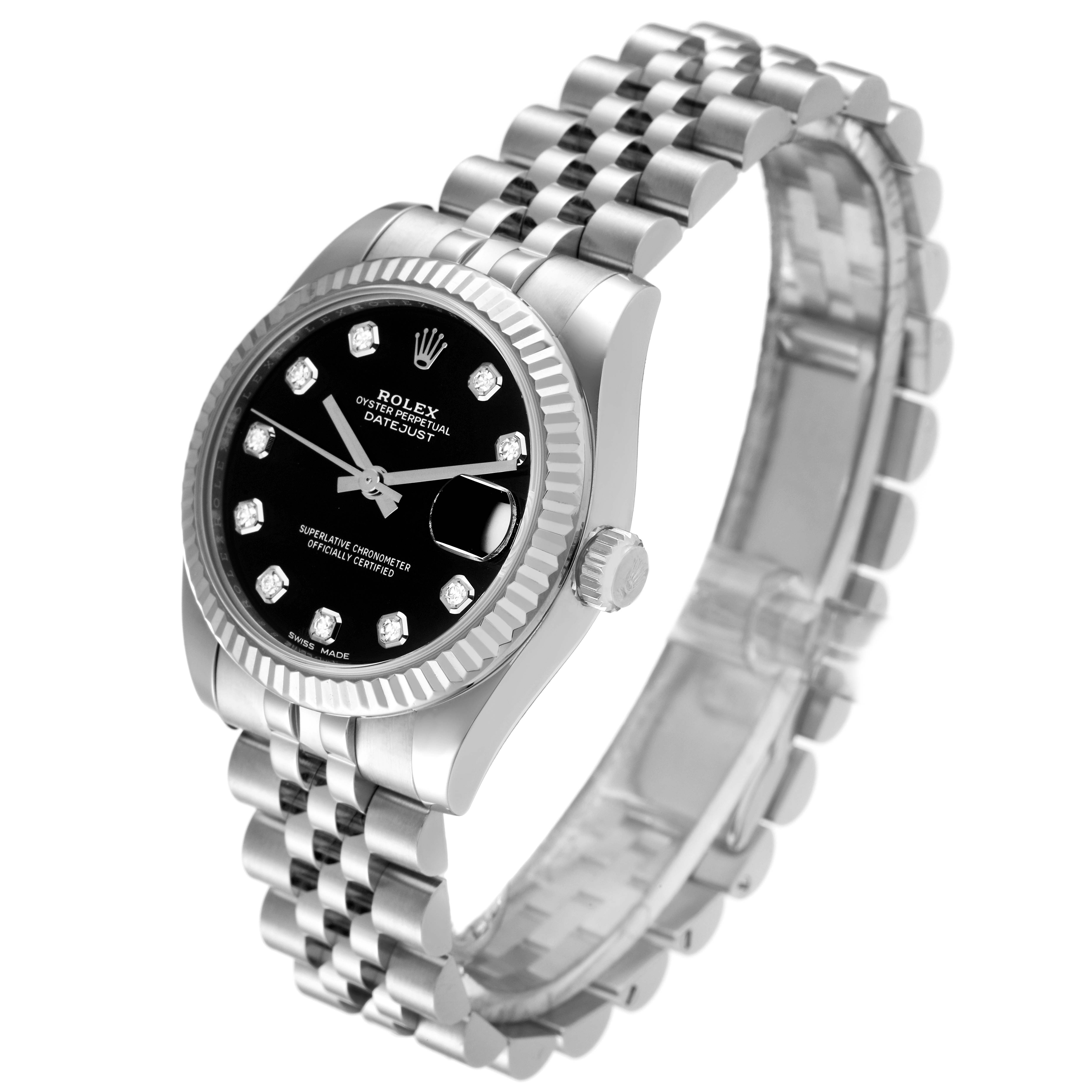 The image shows a mid-size Rolex Datejust watch from an angled view, highlighting its black dial, bezel, crown, and Jubilee bracelet.