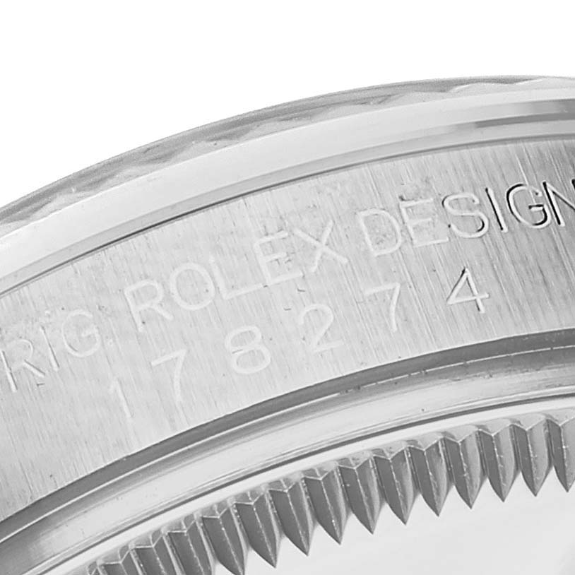 This close-up angle shows the engraved bezel edge of the Mid-Size Rolex watch.