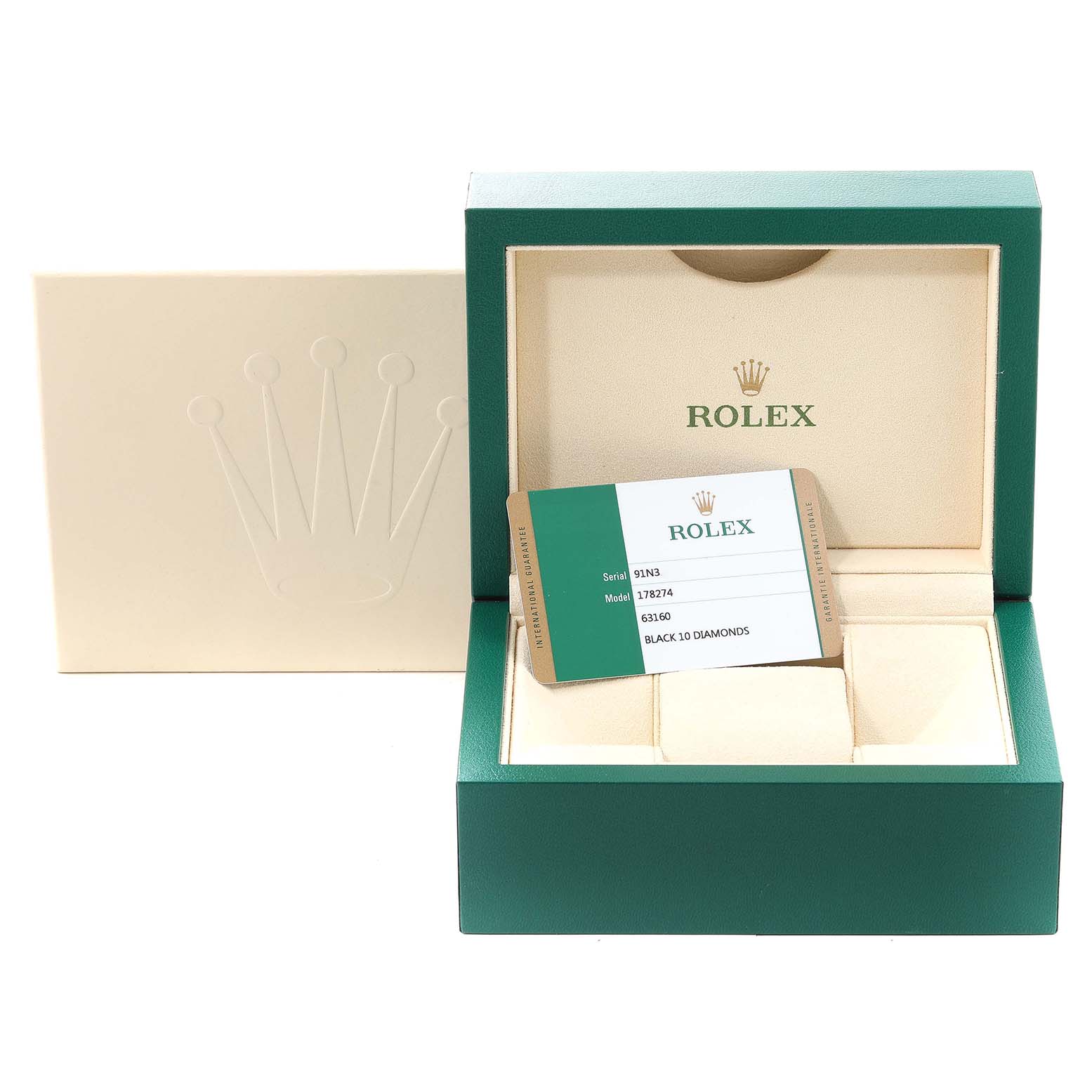 The image shows a green Rolex box for a Mid-Size model, an outer cream cover, and a certification card with the model details.