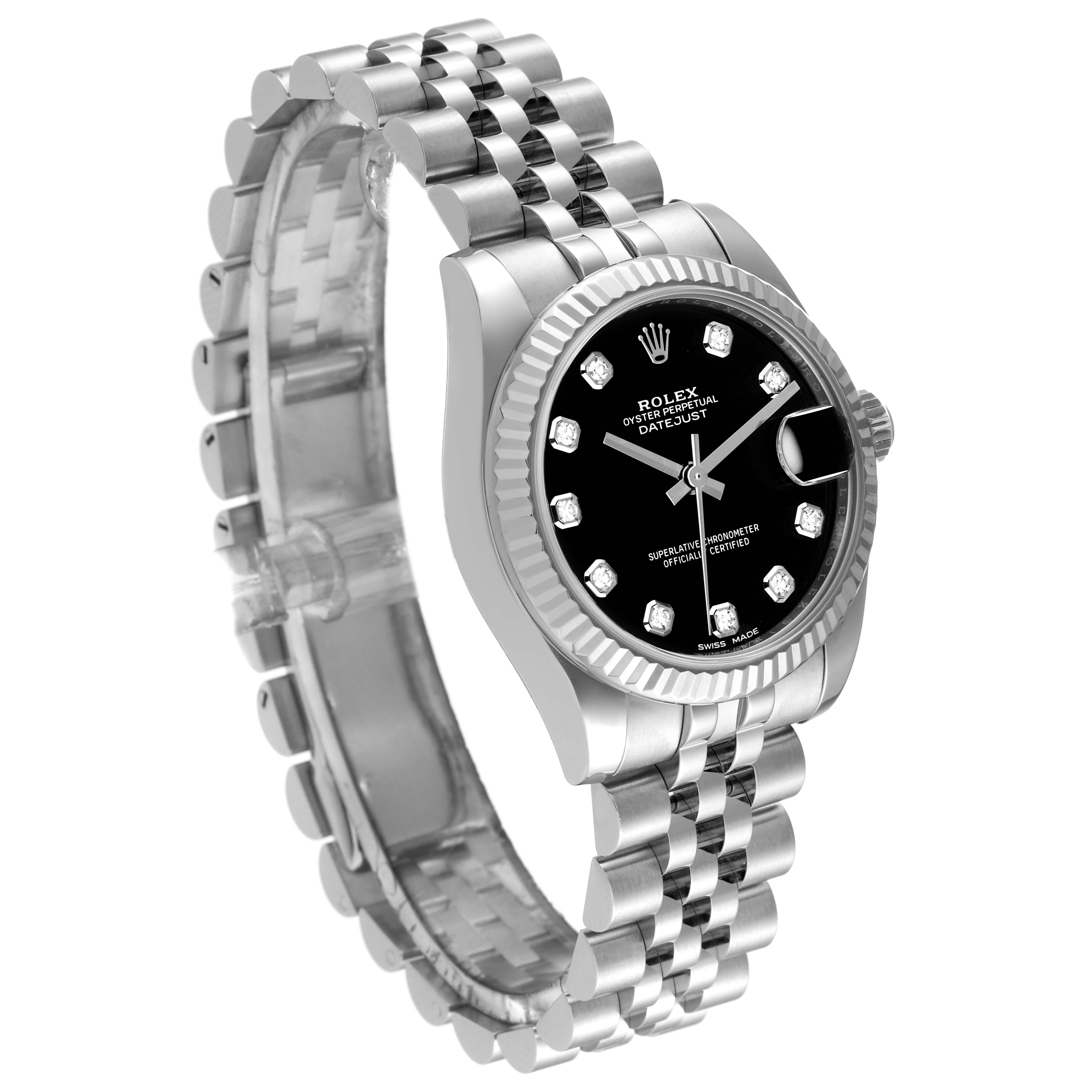 The image shows a Rolex Mid-Size 178274 Women
s Stainless Steel Black Dial 178274 Women
s Stainless Steel Black Dial Oyster Perpetual Datejust watch at an angled side view, highlighting its black dial, diamond hour markers, and Jubilee bracelet.