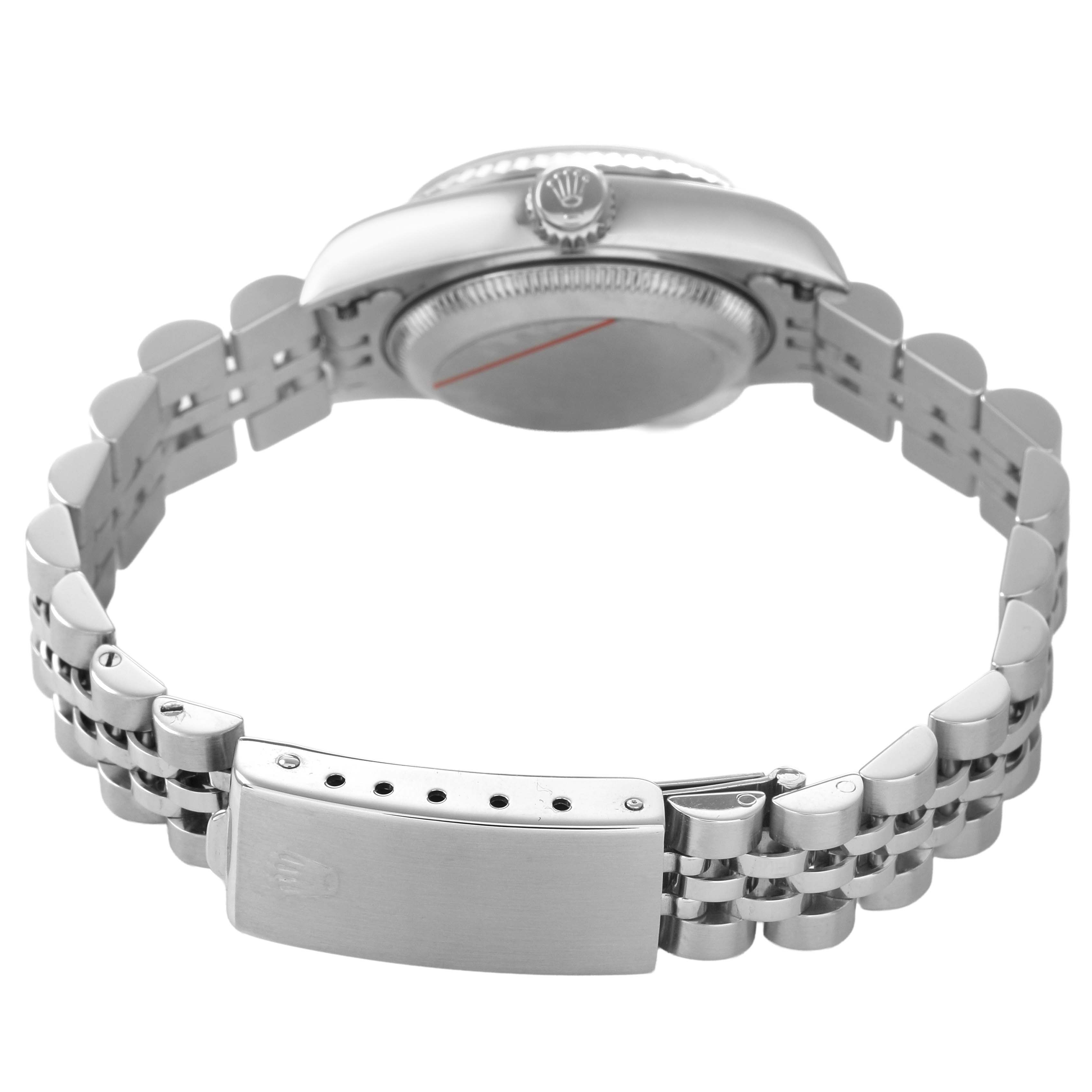 The Rolex Datejust 79174 Women's Stainless Steel Mother of Pearl Dial watch is shown from the back, highlighting the bracelet, clasp, case back, and crown.