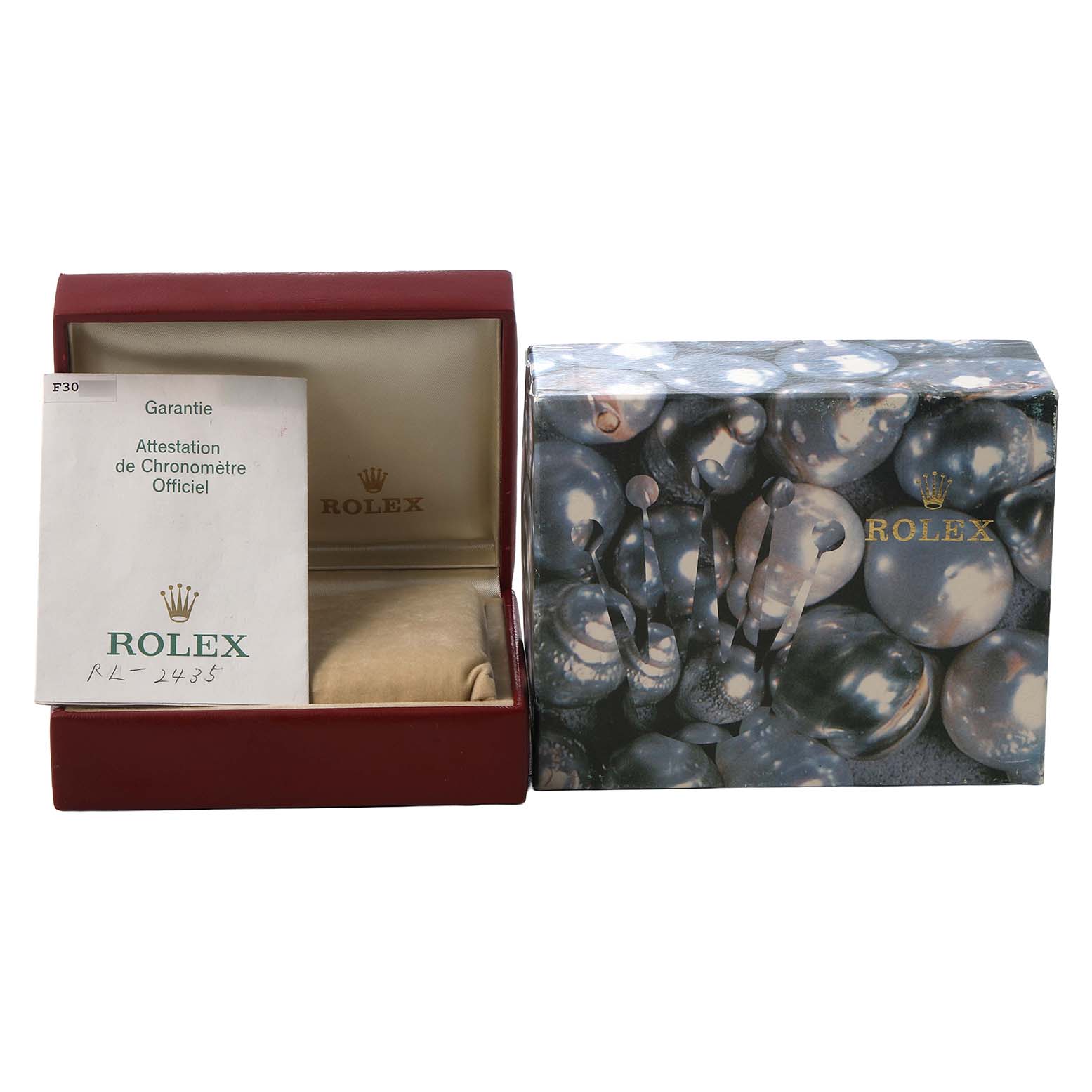 The image shows a Rolex Datejust 79174 Women's Stainless Steel Mother of Pearl Dial box, warranty booklet, and decorative outer cover.