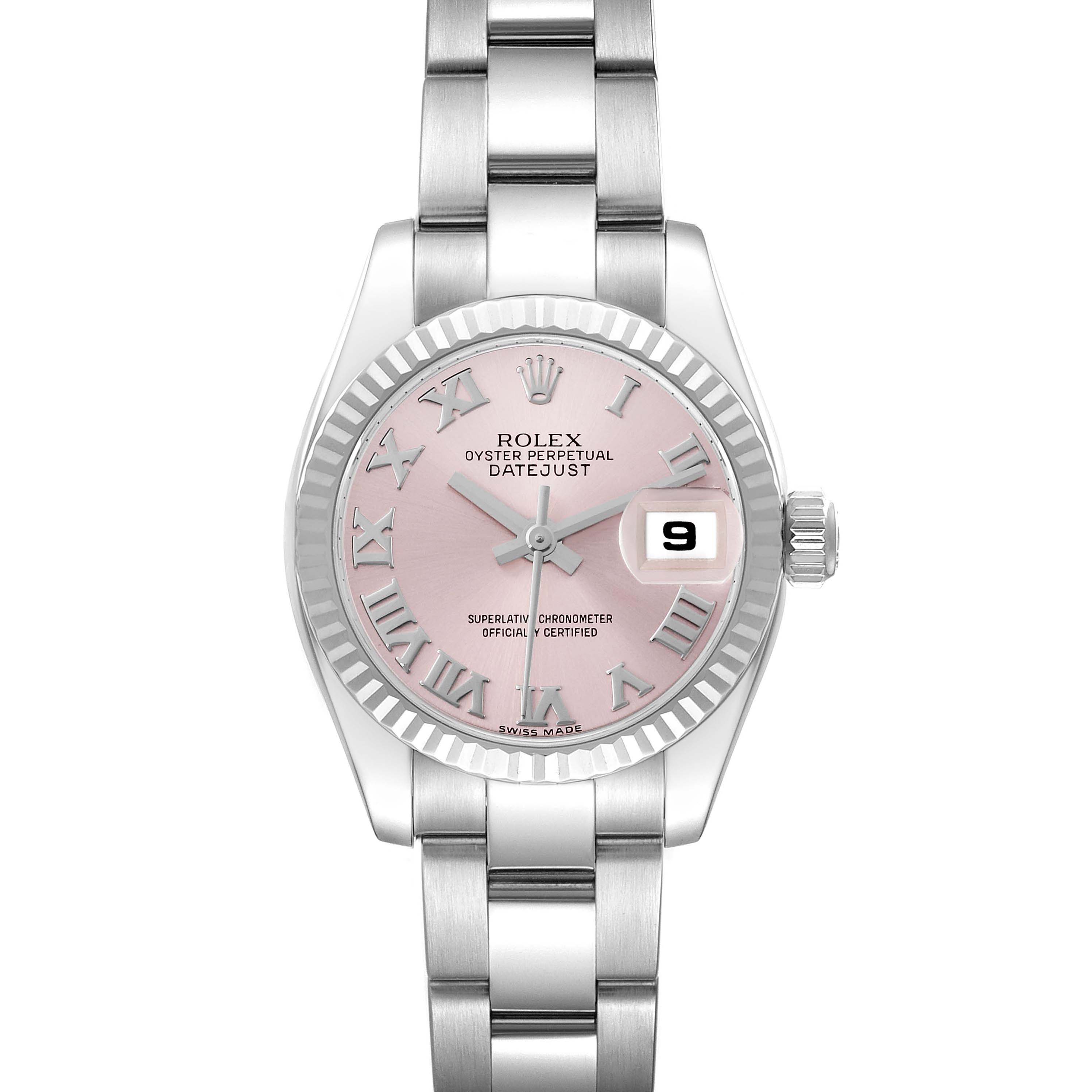 The Rolex Datejust 179174 Women's Stainless Steel Pink Dial watch is shown from the front, displaying its pink dial, Roman numerals, fluted bezel, and metal bracelet.