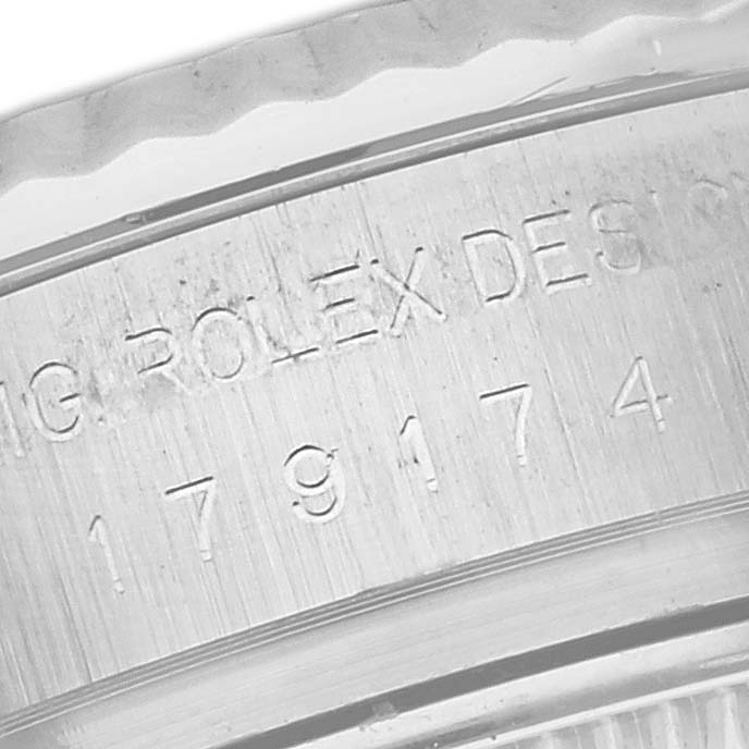 The image shows a close-up angle of a Rolex Datejust 179174 Women's Stainless Steel Pink Dial model's case engraving.