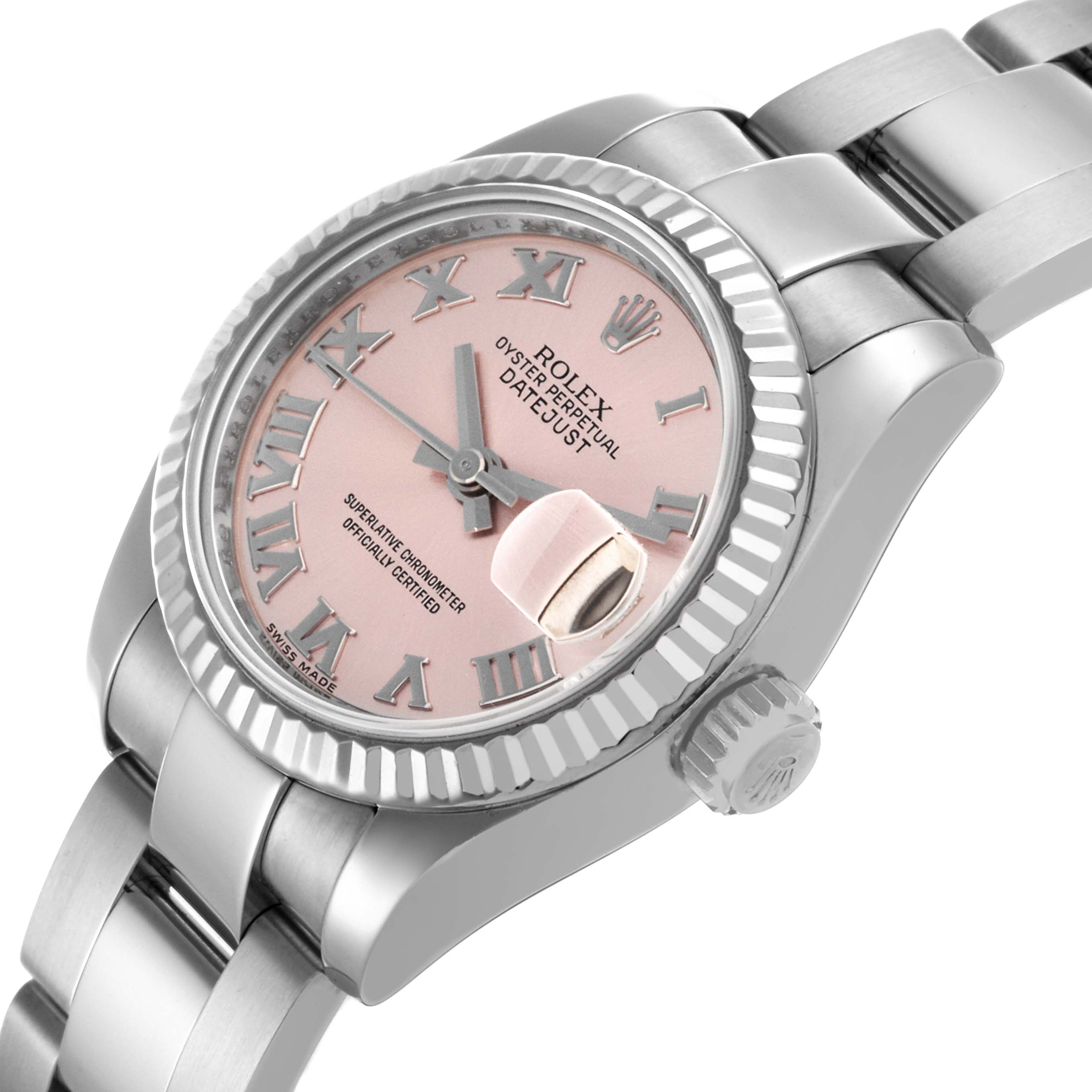 The Rolex Datejust 179174 Women's Stainless Steel Pink Dial watch is shown from a side angle highlighting the dial, bezel, crown, and part of the bracelet.