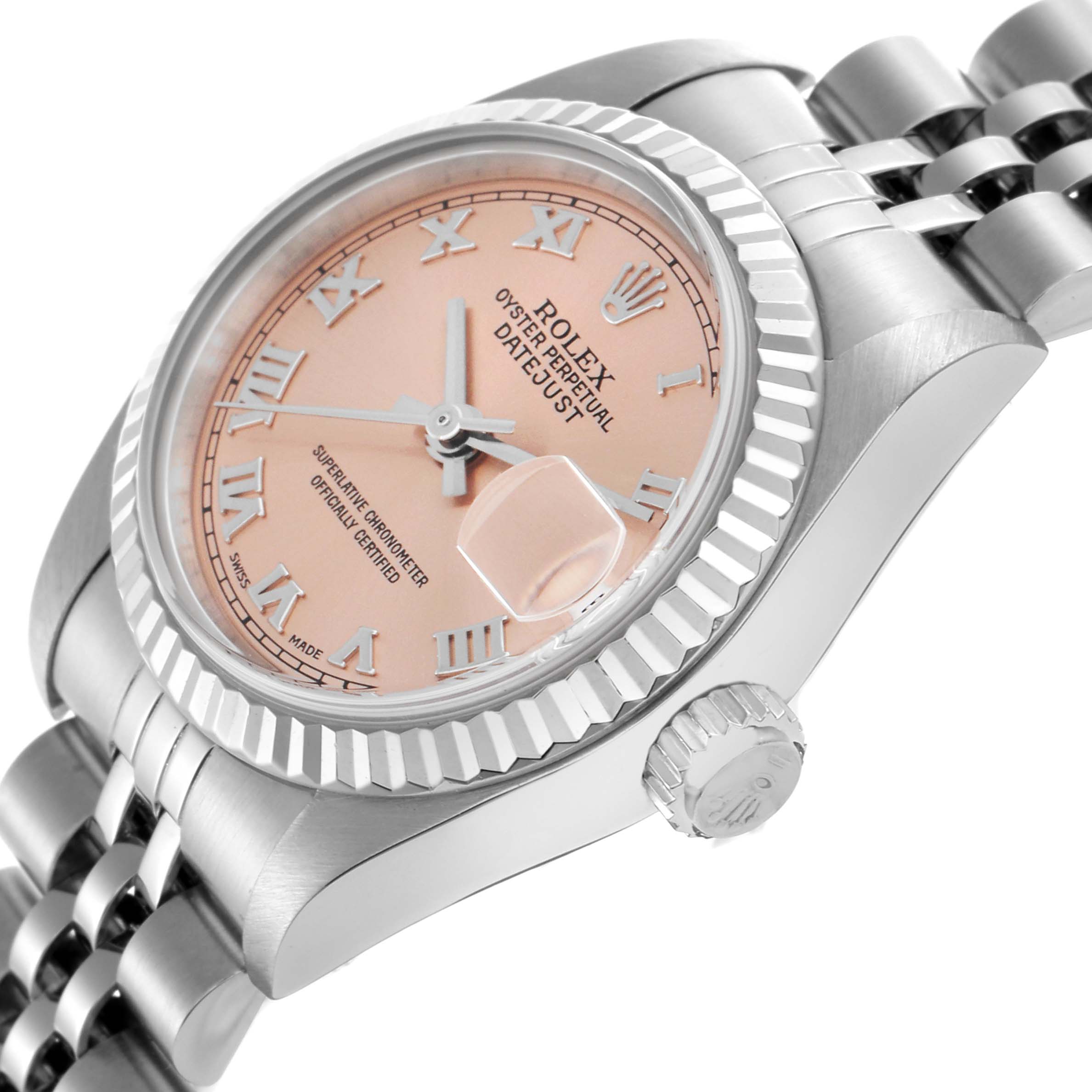 The Rolex Datejust 79174 Women
s Stainless Steel Pink Dial 79174 Women
s Stainless Steel Pink Dial watch is shown at a slight angled side view, highlighting the bezel, dial, crown, and part of the bracelet.