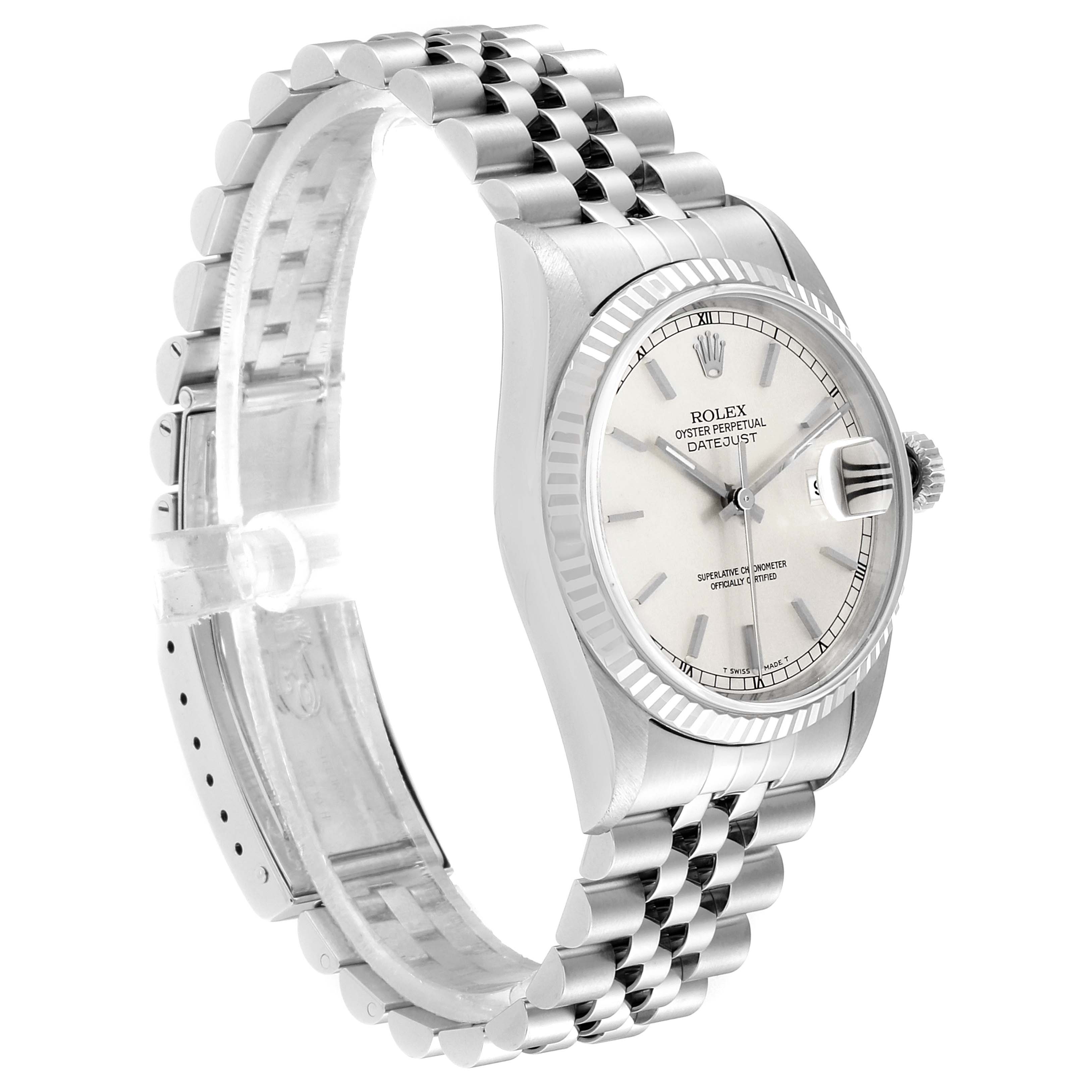 The Rolex Datejust 16234 Men
s White Gold Silver Dial 16234 Men
s White Gold Silver Dial watch is shown from an angled view, displaying the dial, bezel, crown, and stainless steel bracelet.