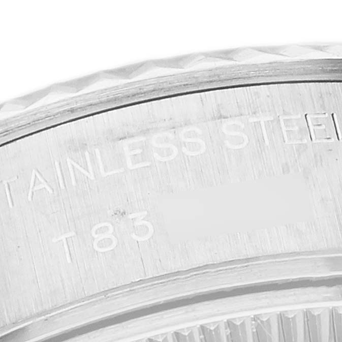 The image shows a close-up of the edge of the stainless steel casing on a Rolex Datejust 69174 Women's Stainless Steel Silver Dial 69174 Women's Stainless Steel Silver Dial watch.