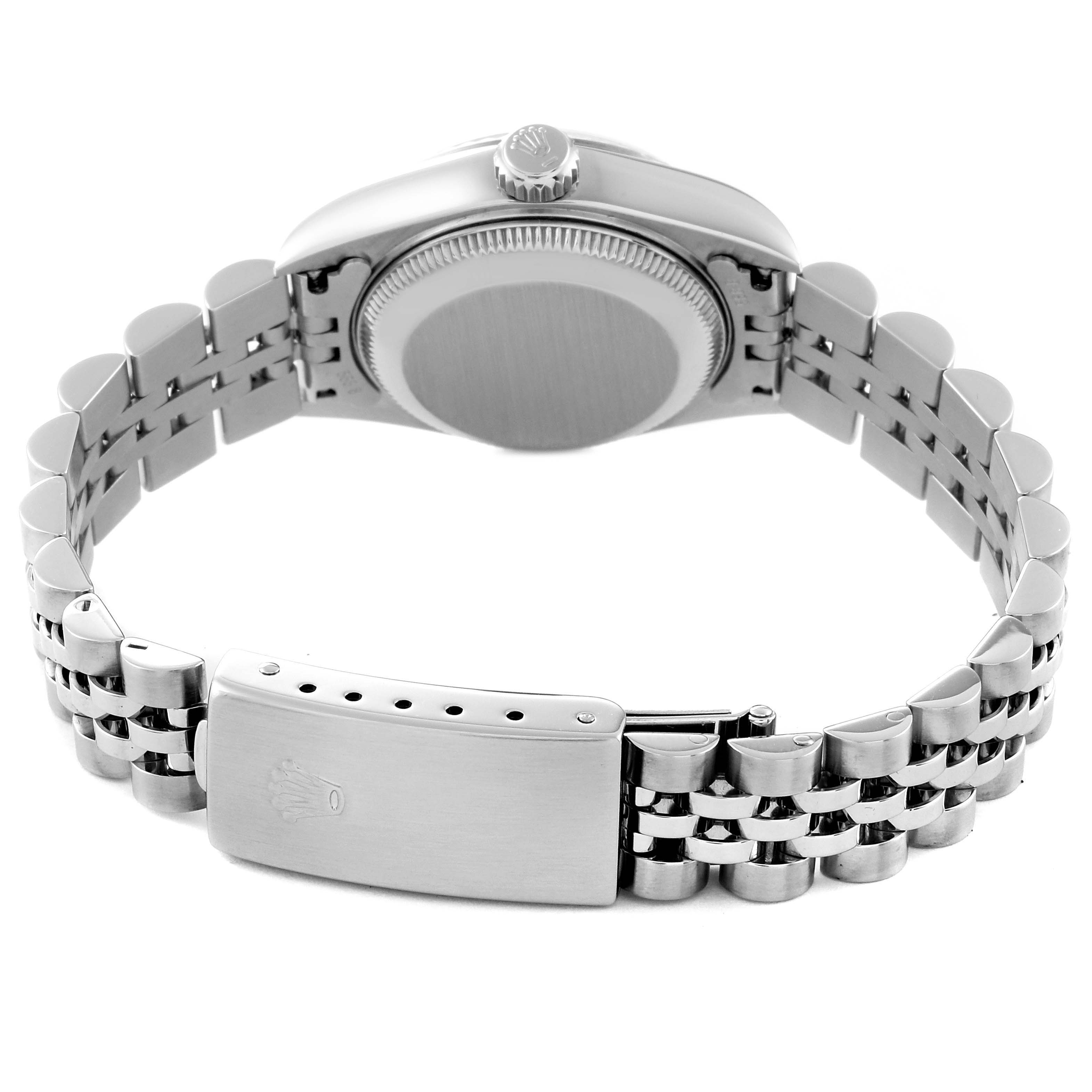 The image shows the backside of the Rolex Datejust 69174 Women's Stainless Steel Silver Dial 69174 Women's Stainless Steel Silver Dial watch, including its case back, crown, and Jubilee bracelet with the clasp.