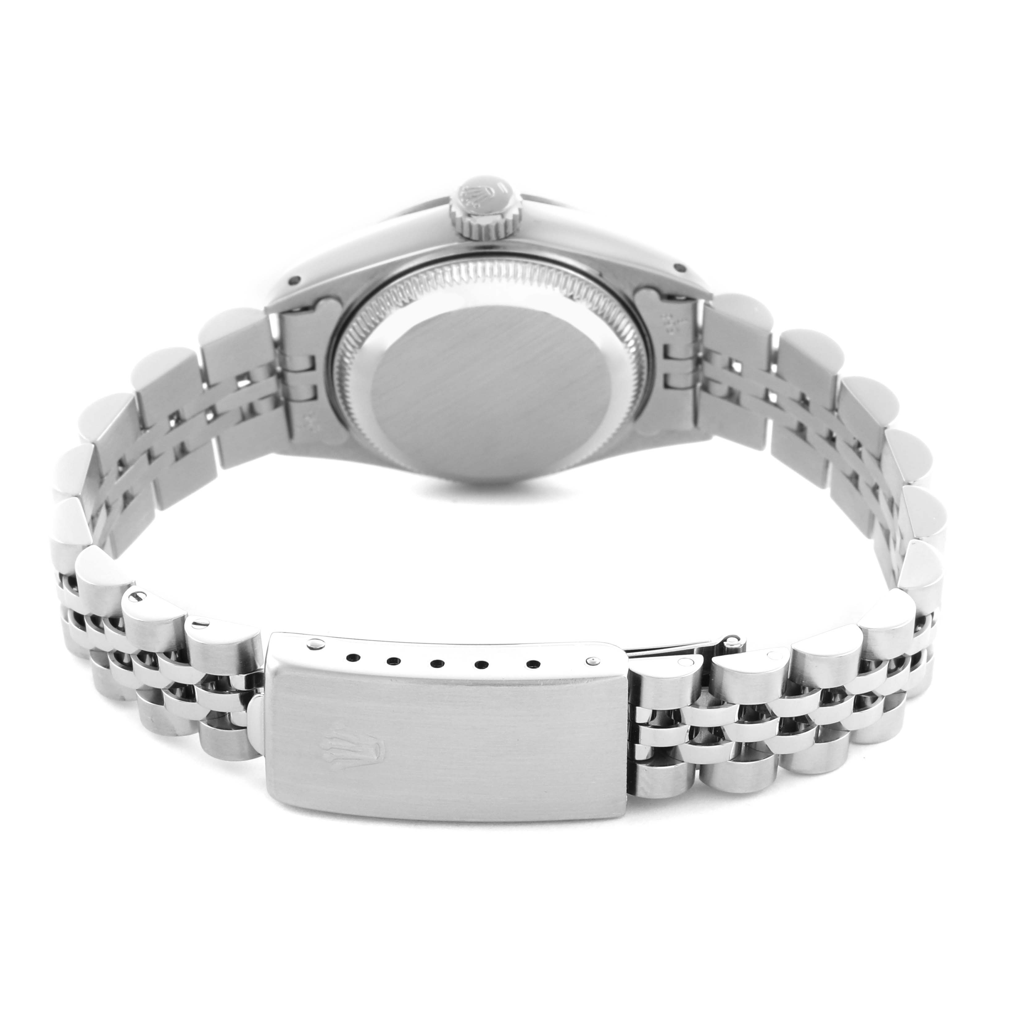 The Rolex Datejust 69174 Women
s Stainless Steel Silver Dial 69174 Women
s Stainless Steel Silver Dial is shown from the back, highlighting the bracelet, clasp, and case back.