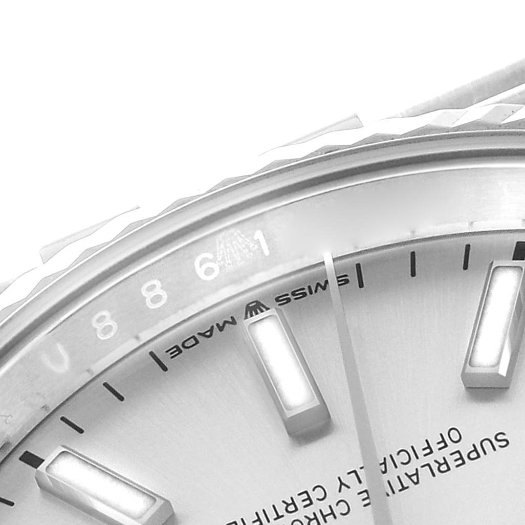 This image shows a close-up angle of the dial and part of the bezel on a Rolex Datejust 126234 Men's Stainless Steel Silver Dial 126234 Men's Stainless Steel Silver Dial watch.