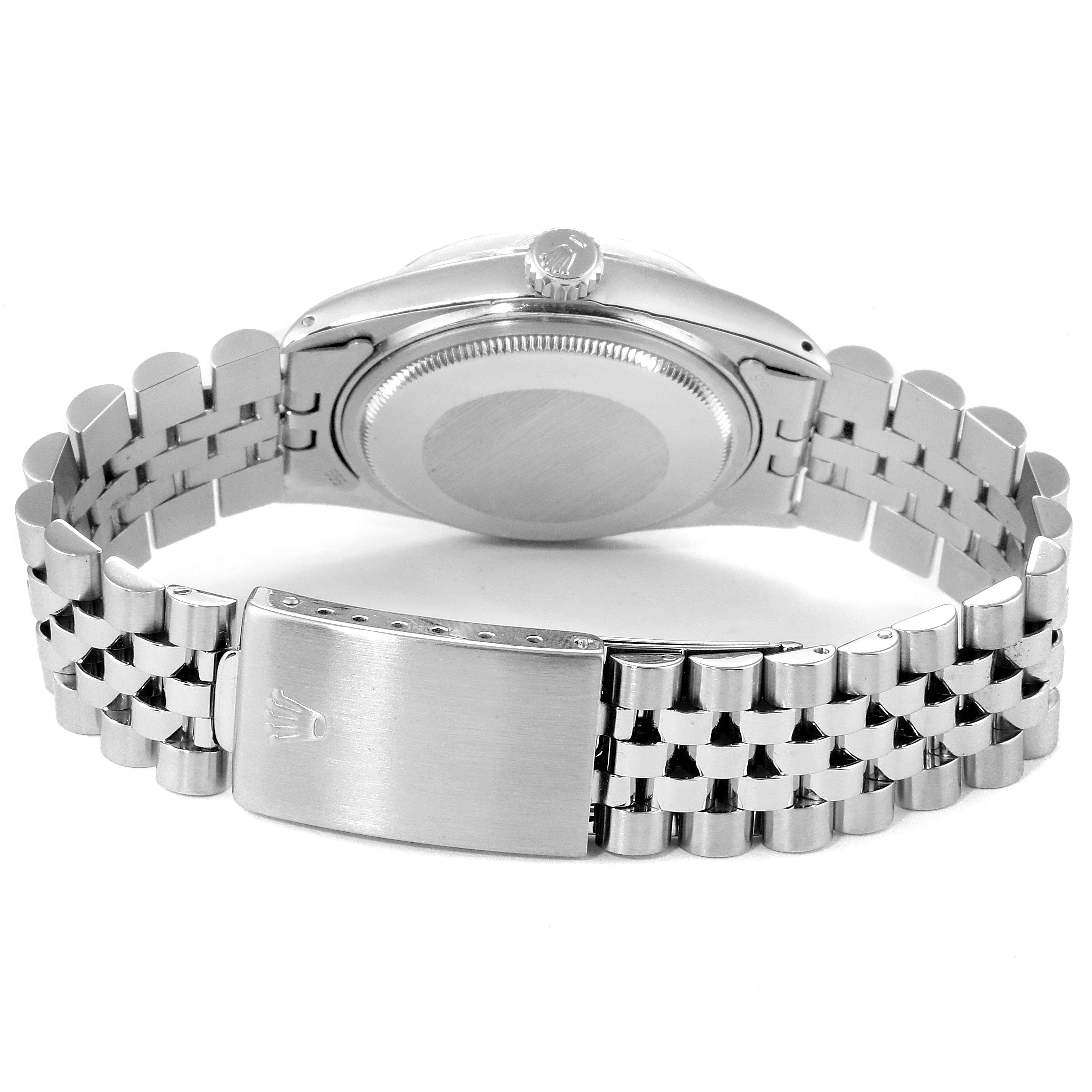 The image shows the back view of a Rolex Vintage Collection 16014 Men's Stainless Steel Silver Dial 16014 Men's Stainless Steel Silver Dial watch including its case back, crown, and bracelet clasp.