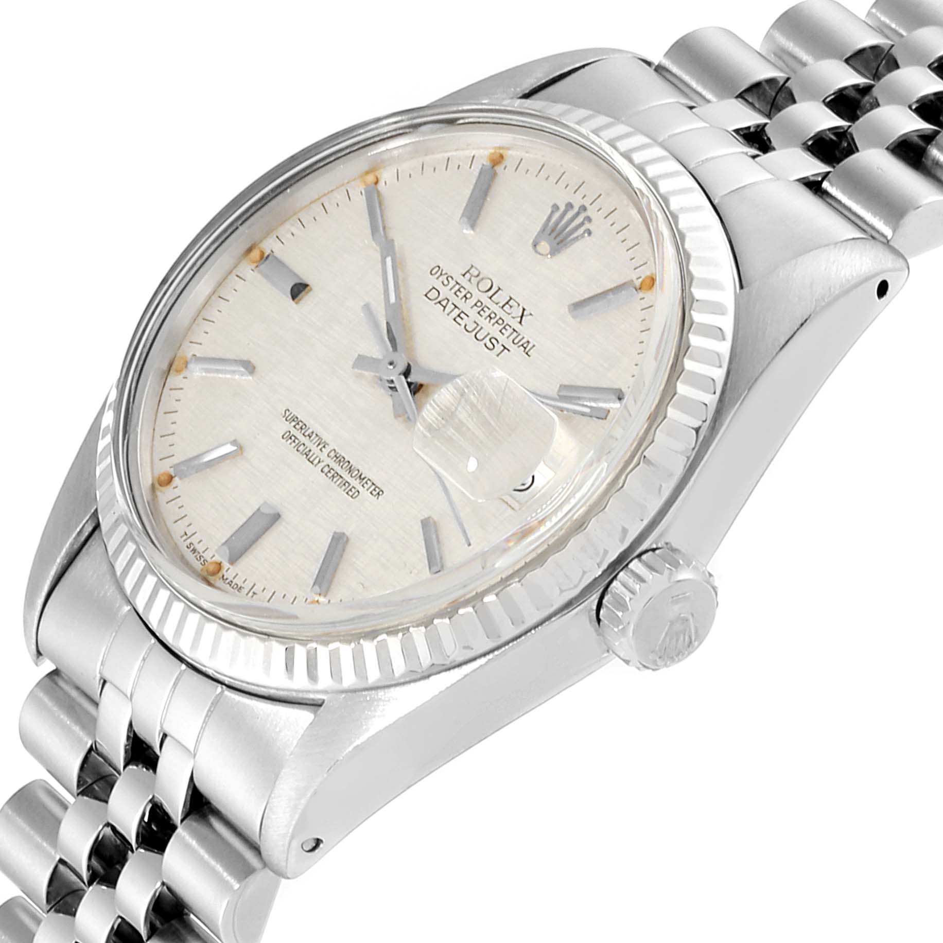 The image shows a top-down angle of a Rolex Vintage Collection 16014 Men's Stainless Steel Silver Dial 16014 Men's Stainless Steel Silver Dial Datejust watch, highlighting the dial, bezel, case, and bracelet.