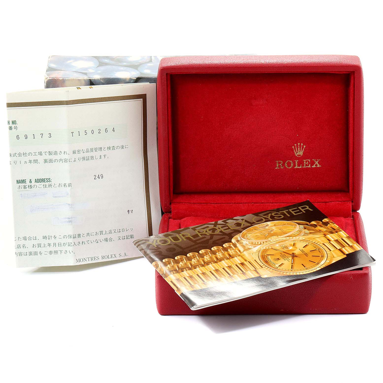 The image shows an open Rolex Datejust 69173 Women
s Steel and Gold (two tone) Beige Dial 69173 Women
s Steel and Gold (two tone) Beige Dial box with its documentation and a booklet placed inside.