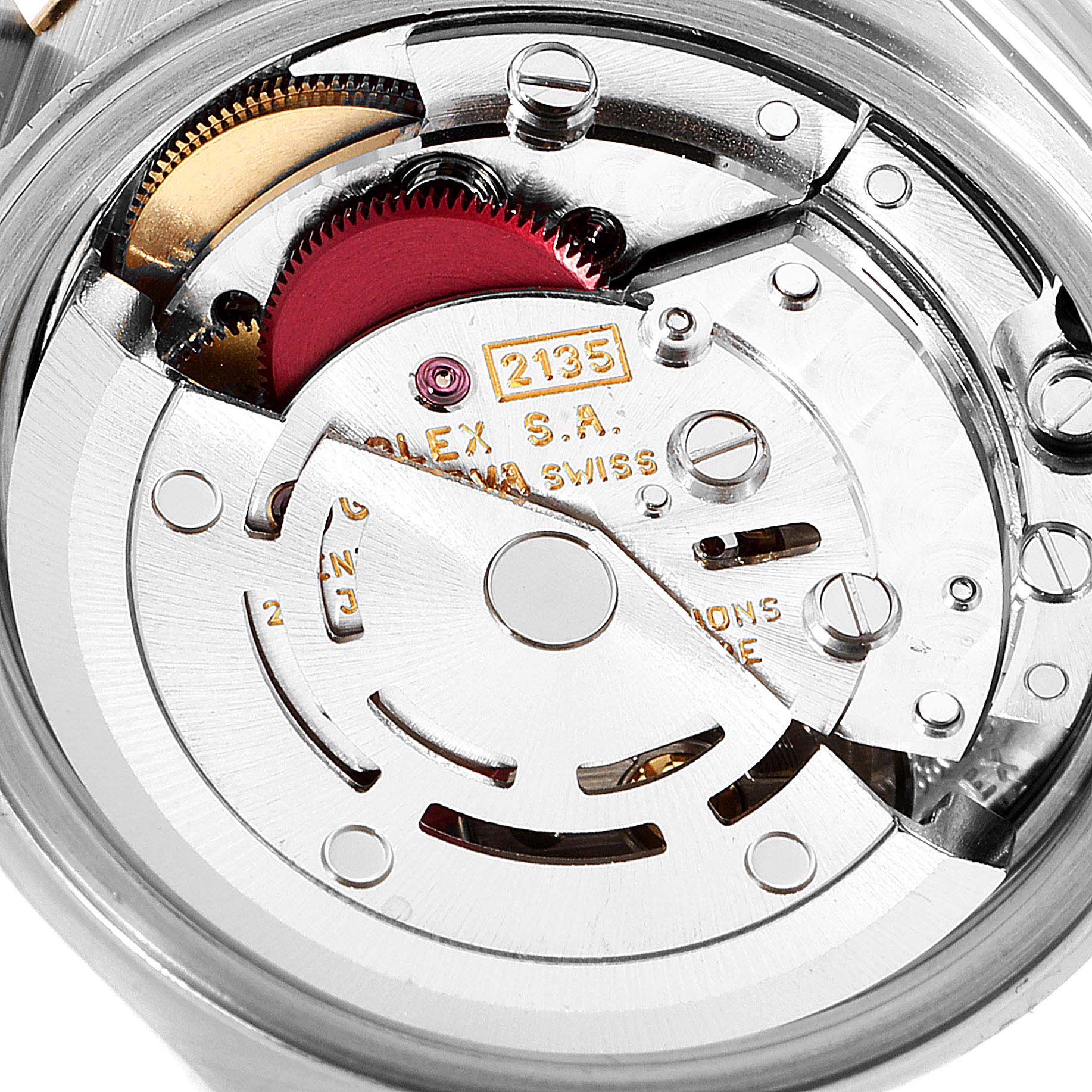 This image shows a close-up of the movement mechanism of a Rolex Datejust 69173 Women
s Steel and Gold (two tone) Beige Dial 69173 Women
s Steel and Gold (two tone) Beige Dial watch, focusing on its intricate components and inner workings.