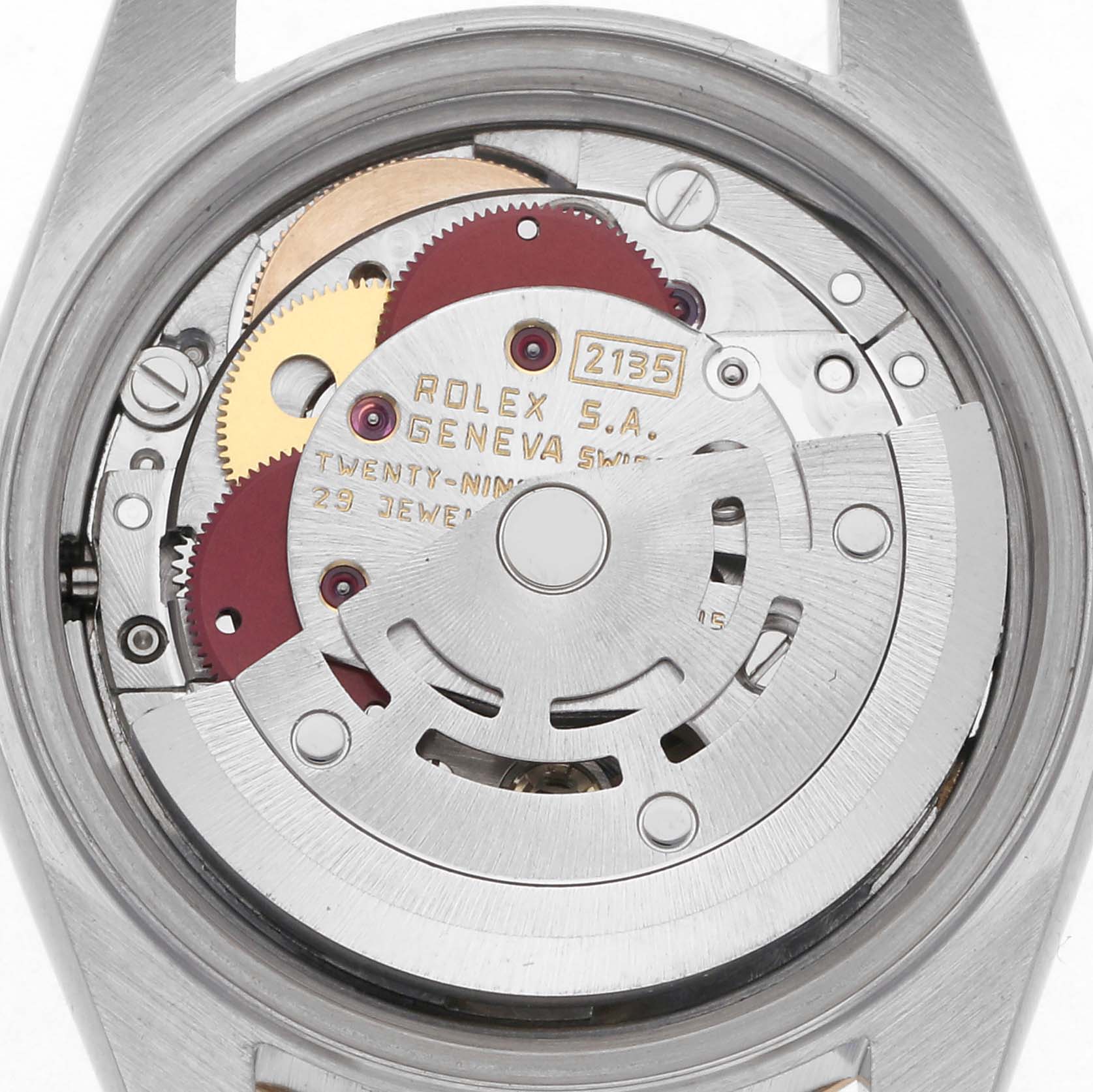 The image shows the Rolex Datejust 69173 Women
s Steel and Gold (two tone) Champagne Dial 69173 Women
s Steel and Gold (two tone) Champagne Dial movement from the back, highlighting gears, rotor, and inscriptions.