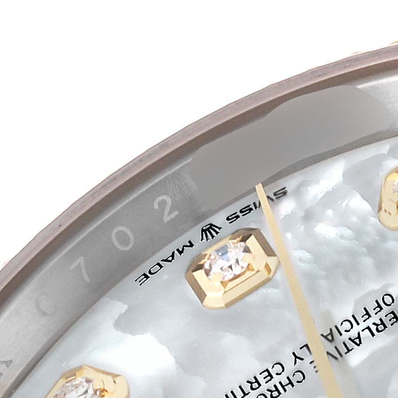 The image shows a close-up of the dial and part of the bezel of a Rolex Datejust 126233 Men's Steel and Gold (two tone) Mother of Pearl Dial 126233 Men's Steel and Gold (two tone) Mother of Pearl Dial watch, highlighting the diamond markers and "Swiss Made" text.