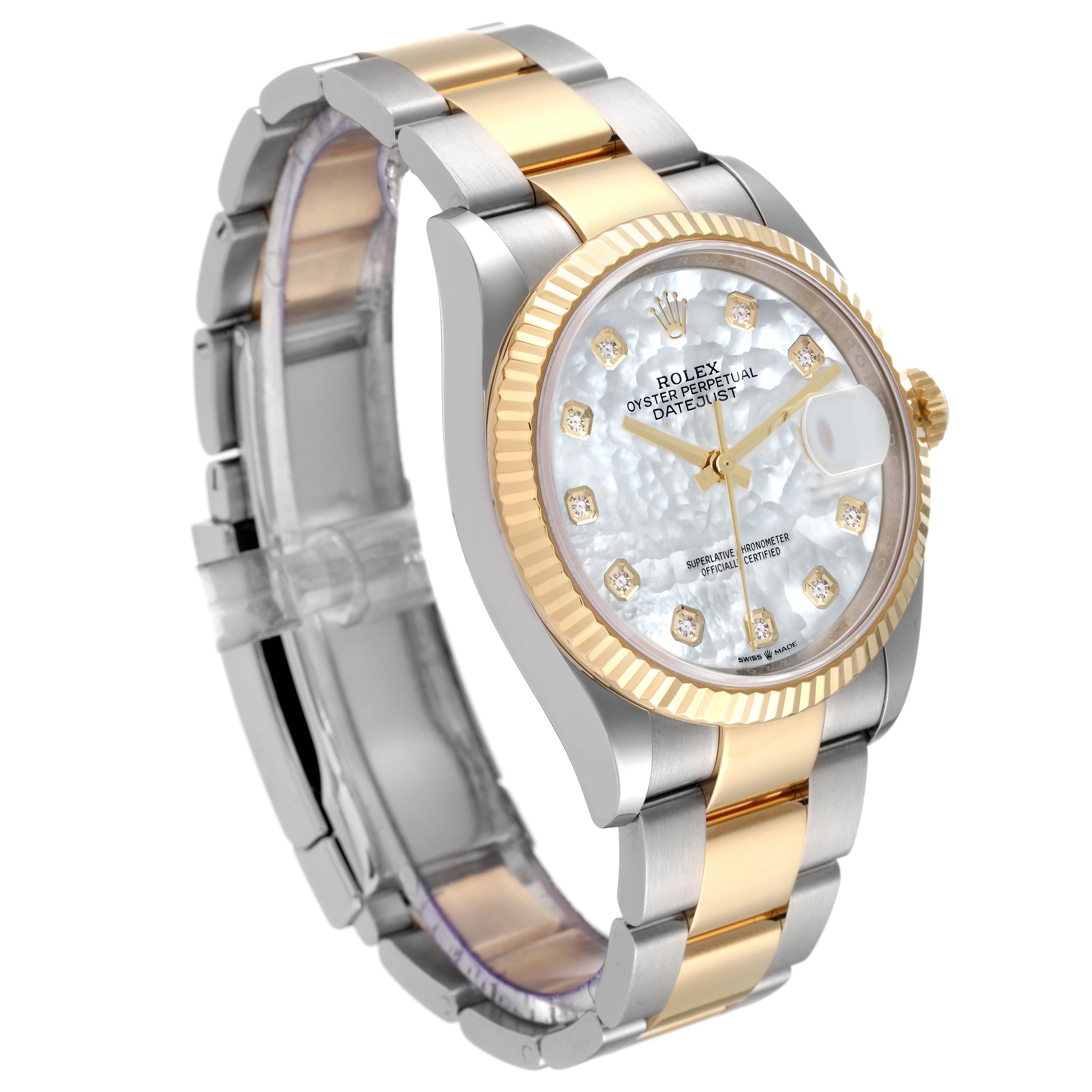 The Rolex Datejust 126233 Men's Steel and Gold (two tone) Mother of Pearl Dial 126233 Men's Steel and Gold (two tone) Mother of Pearl Dial watch is shown at a slight angle, showcasing its two-tone band, fluted bezel, and mother of pearl dial with diamond markers.