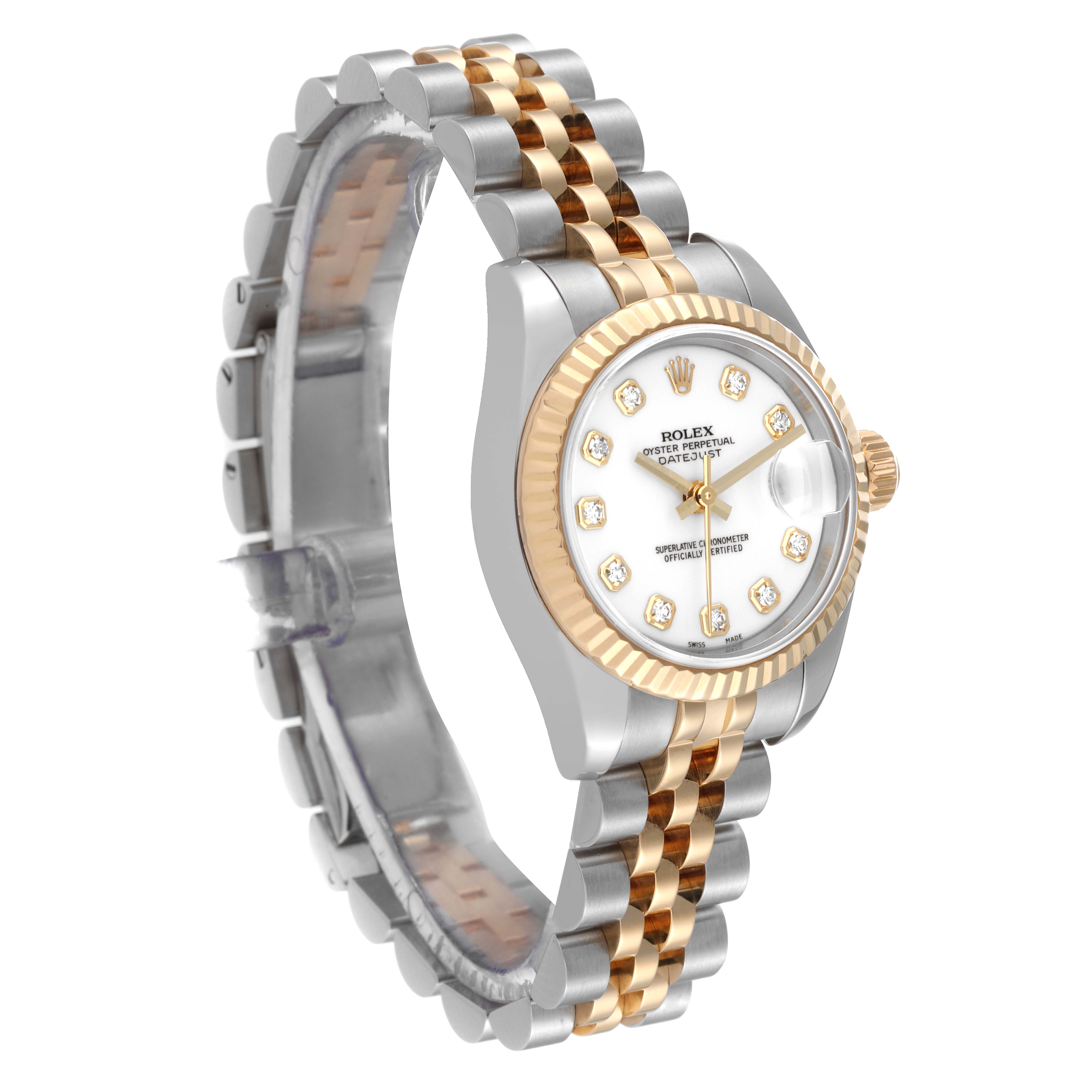 The image displays a Rolex Datejust 179173 Women's Steel and Gold (two tone) White Dial 179173 Women's Steel and Gold (two tone) White Dial watch at a three-quarter angle, showing the face, bezel, and two-tone bracelet.