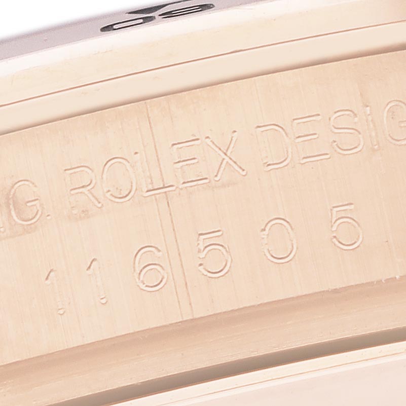The image shows a close-up of the side engraving on a Rolex Daytona 116505 Men
s Rose Gold Brown Dial 116505 Men
s Rose Gold Brown Dial, highlighting the design and model number.