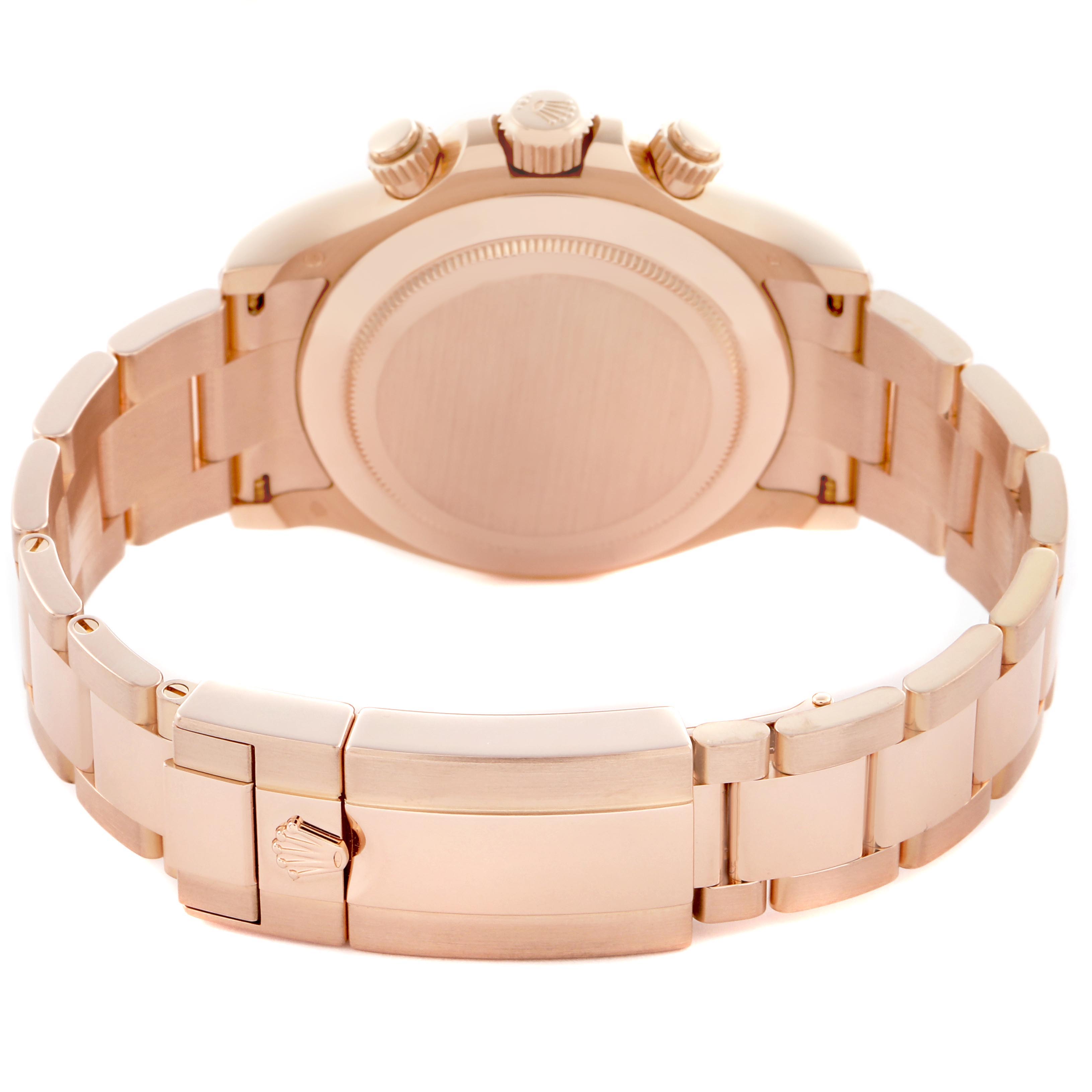 The image shows the back and side of the Rolex Daytona 116505 Men
s Rose Gold Brown Dial 116505 Men
s Rose Gold Brown Dial watch, highlighting the bracelet and clasp.