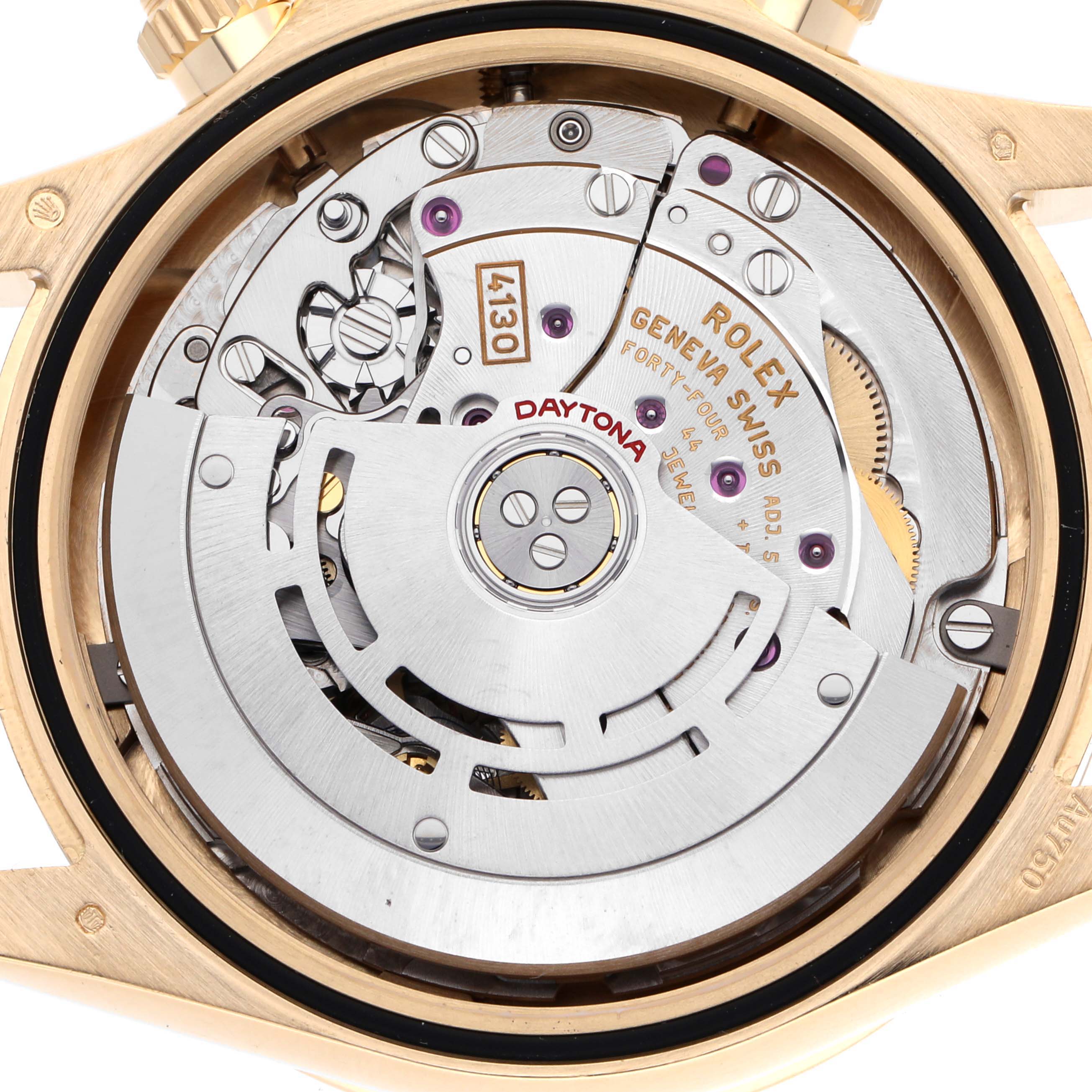 The image shows a close-up of the Rolex Daytona 116508 Men
s Yellow Gold Black Dial 116508 Men
s Yellow Gold Black Dial watch
s movement, highlighting its intricate internal mechanics.