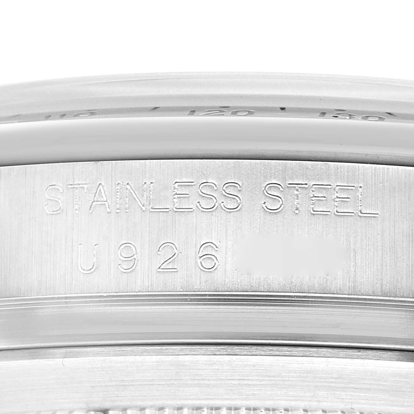 This image shows a close-up of the stainless steel case back of a Rolex Daytona 16520 Men's Stainless Steel White Dial 16520 Men's Stainless Steel White Dial watch.