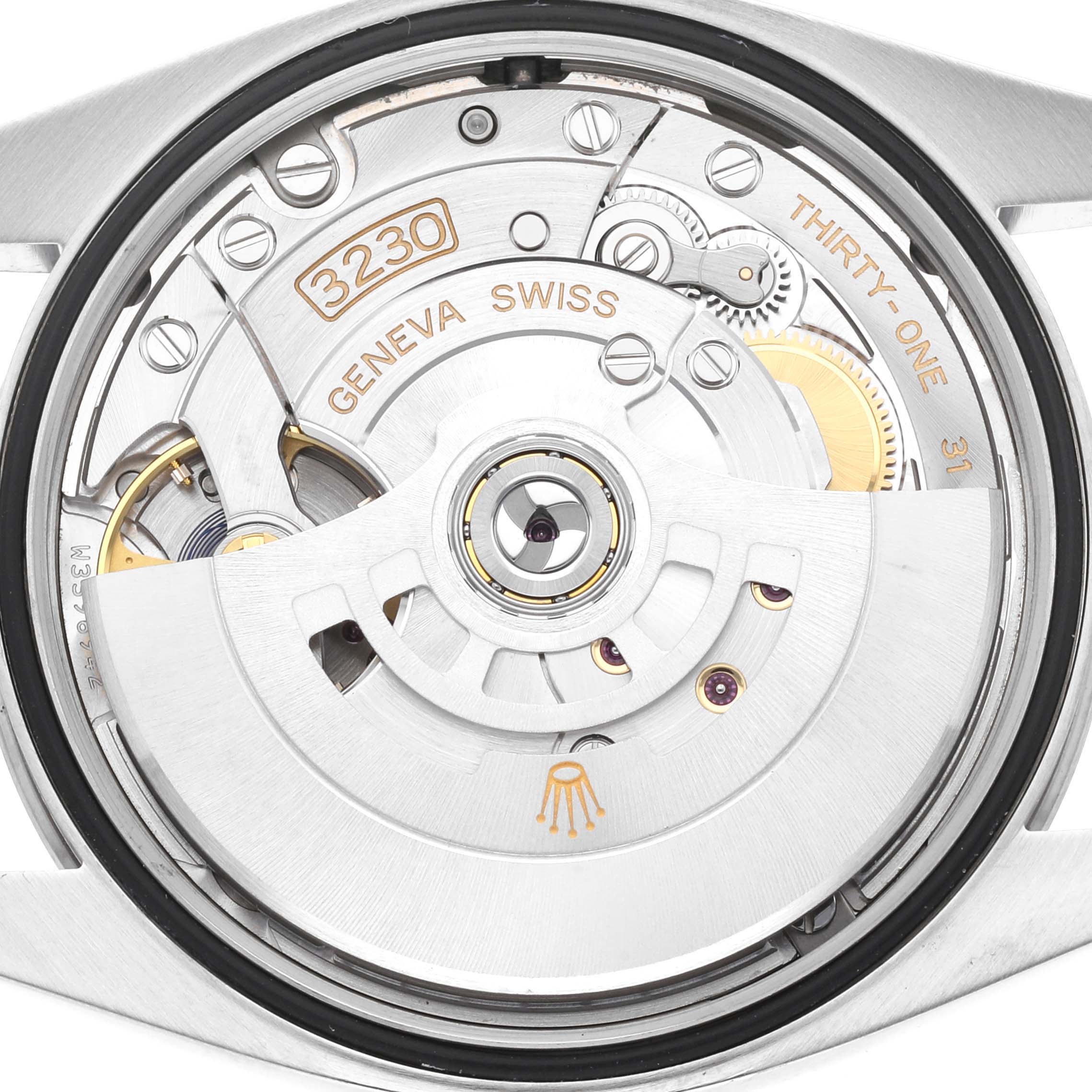 The image shows a close-up view of the movement mechanism of a Rolex Explorer 124270 Men
s Stainless Steel Black Dial 124270 Men
s Stainless Steel Black Dial watch, highlighting the intricate inner components.