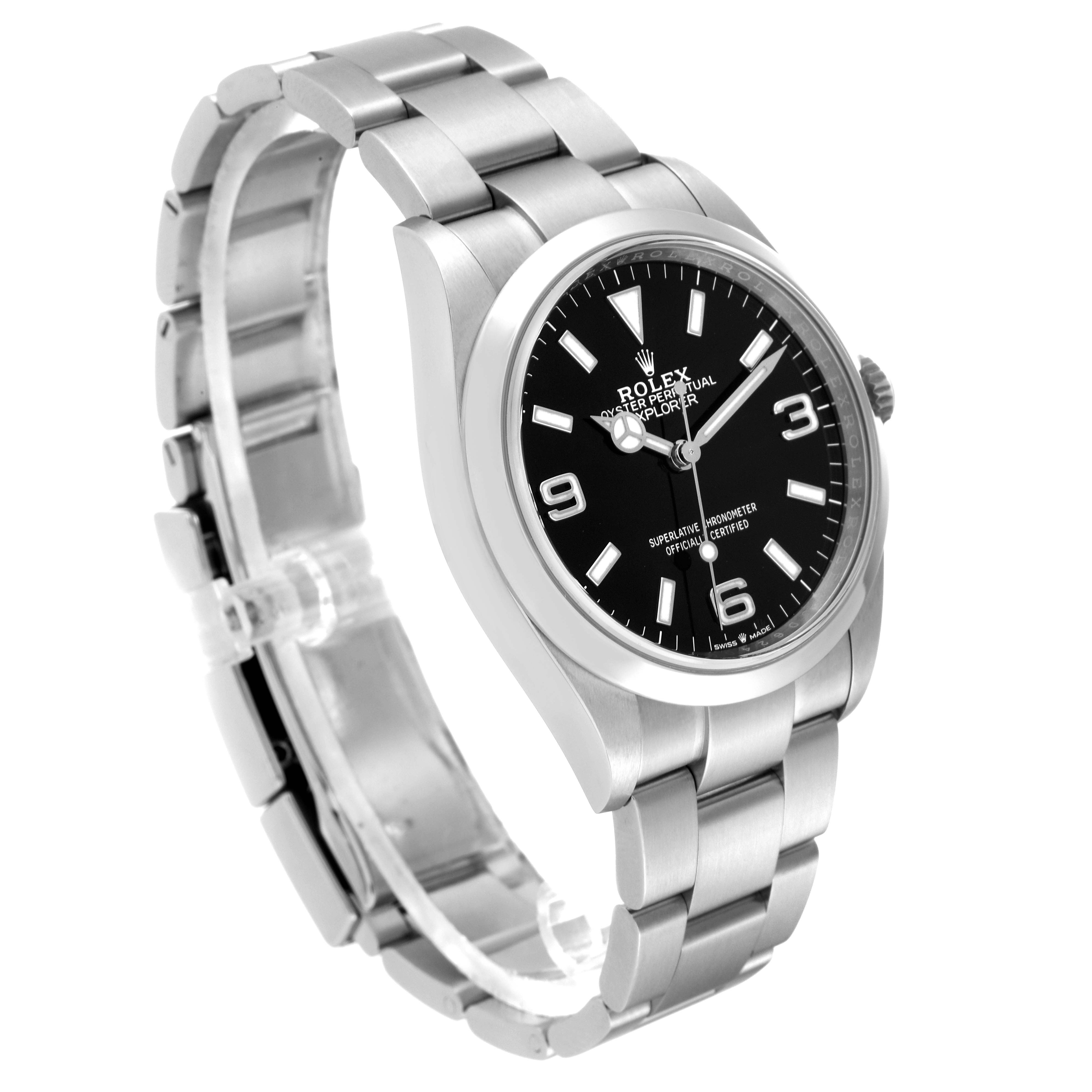 The image shows a side angle of a Rolex Explorer 124270 Men
s Stainless Steel Black Dial 124270 Men
s Stainless Steel Black Dial watch, highlighting the black dial, bezel, crown, and metal bracelet.