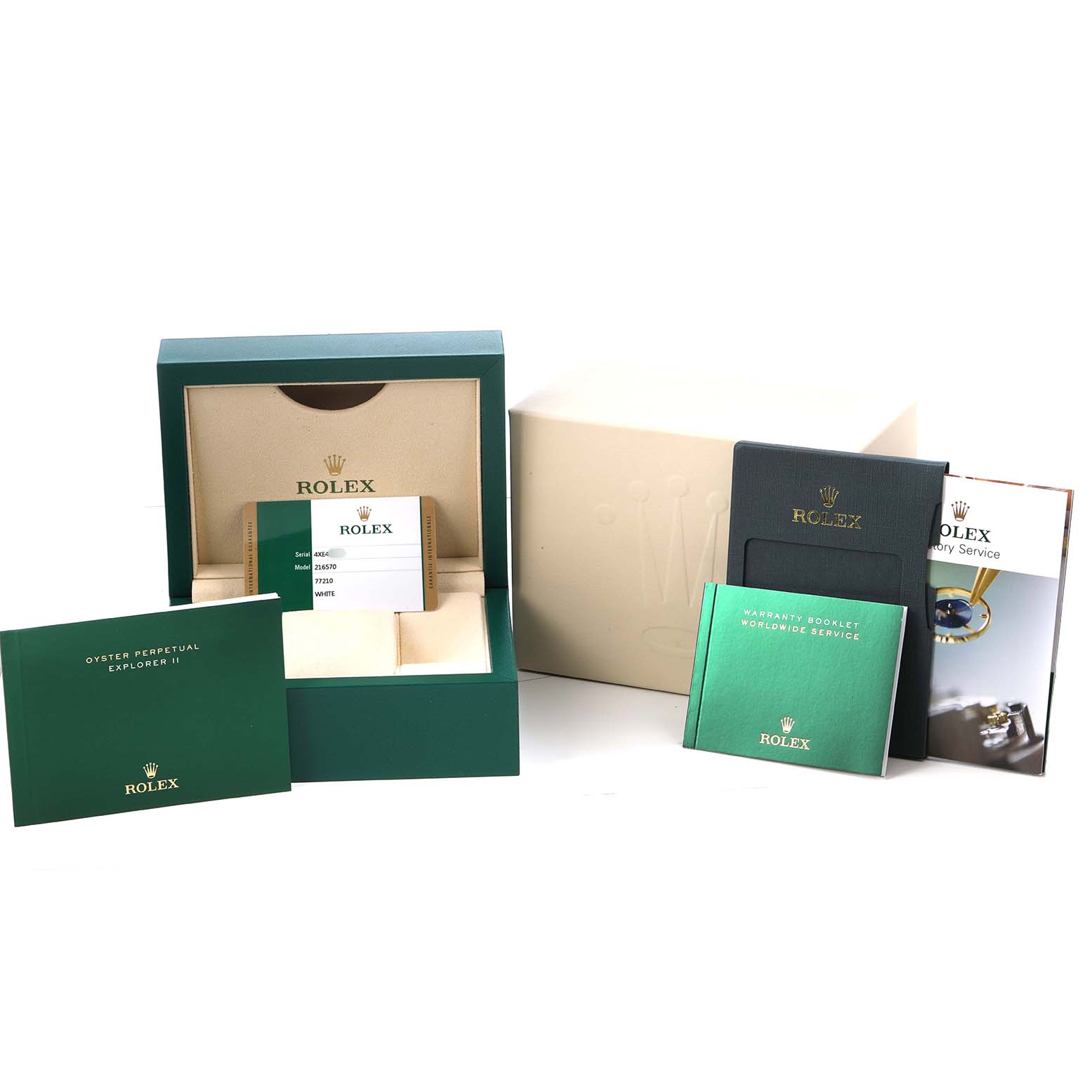The image shows the packaging and accessories for a Rolex Explorer 216570 Men's Stainless Steel White Dial model, including the box, warranty booklet, and service manuals.