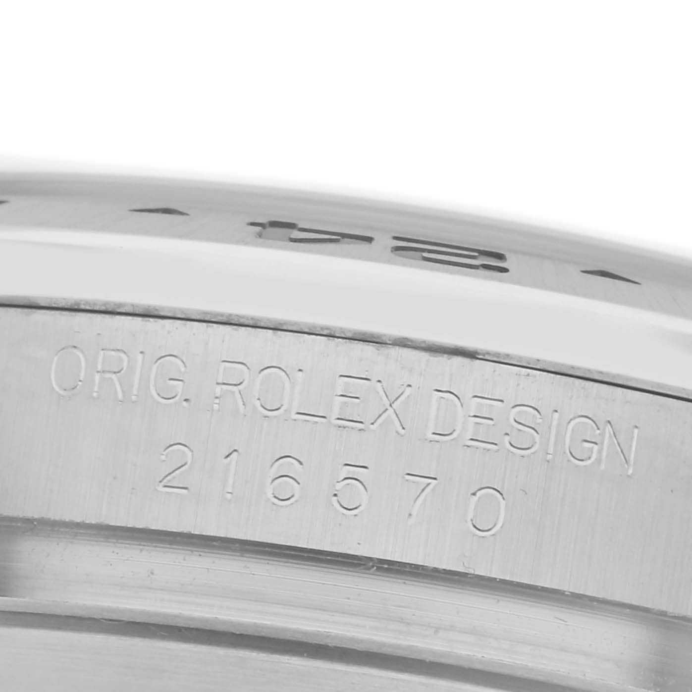 The image shows a close-up of the side of the Rolex Explorer 216570 Men
s Stainless Steel White Dial 216570 Men
s Stainless Steel White Dial, featuring engraved model details.