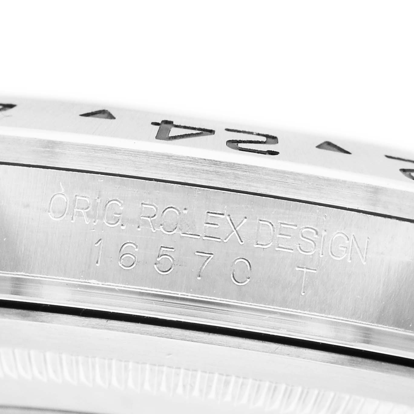 The image shows a close-up of the side engraving on a Rolex Explorer 16570 Men's Stainless Steel Black Dial watch, highlighting the model number 16570.