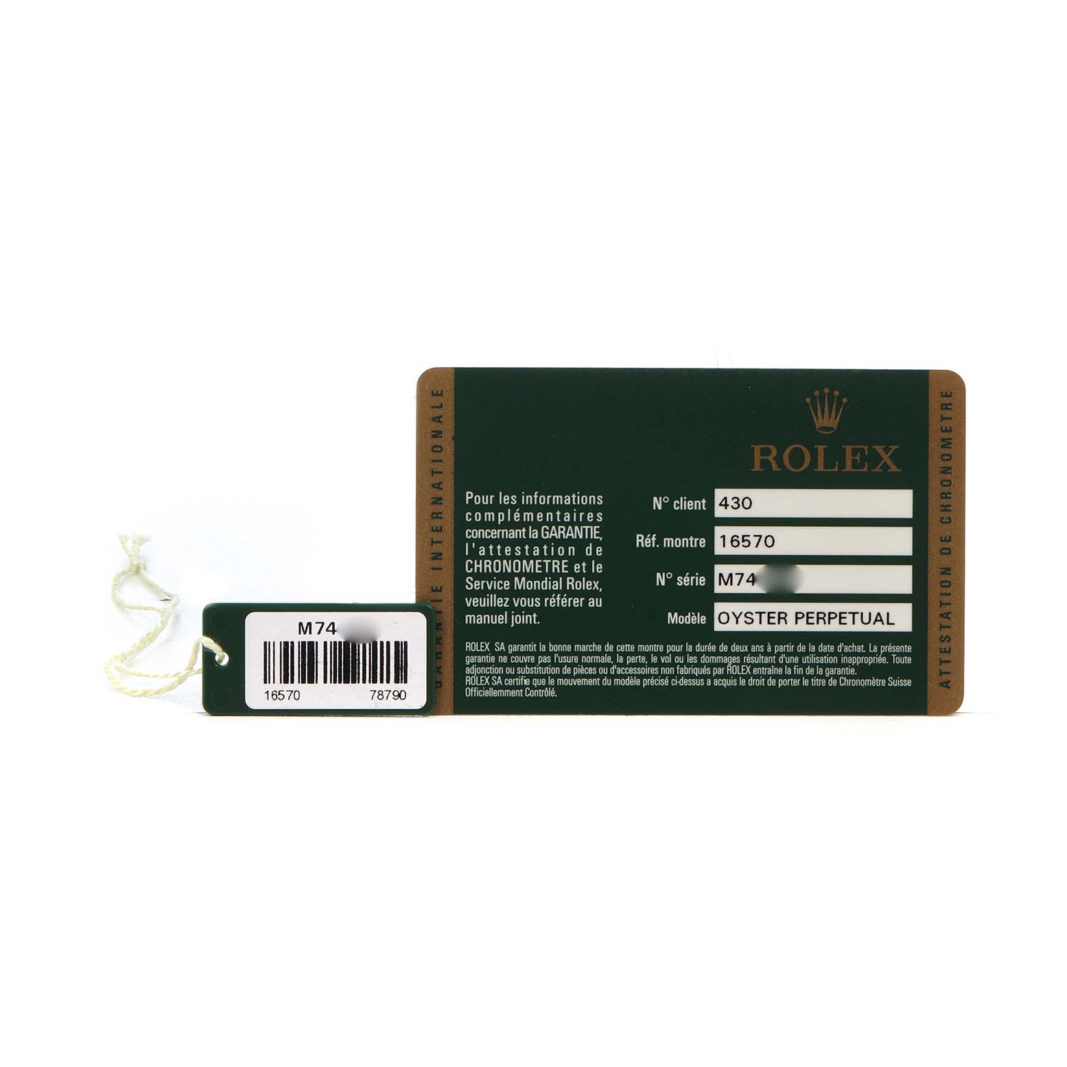 The image shows a Rolex Explorer 16570 Men's Stainless Steel Black Dial watch warranty card and a tag with model number details, viewed from the front.