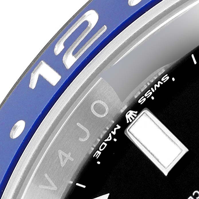 This close-up image shows the bezel, part of the dial, and the "Swiss Made" text of the Rolex GMT-Master 126710 Men's Stainless Steel Black Dial 126710 Men's Stainless Steel Black Dial watch.