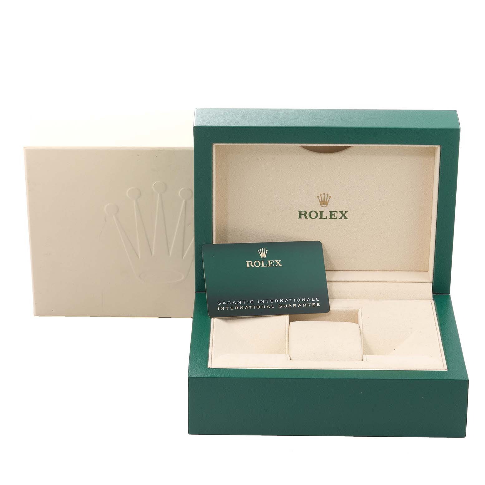 This image shows an open Rolex GMT-Master 126710 Men's Stainless Steel Black Dial 126710 Men's Stainless Steel Black Dial box with an international guarantee card in front.