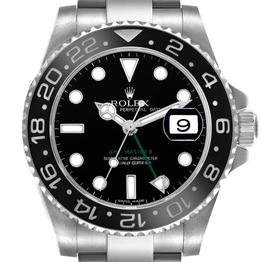 The Rolex GMT-Master watch is shown from the front, highlighting the bezel, dial, hands, and date feature.