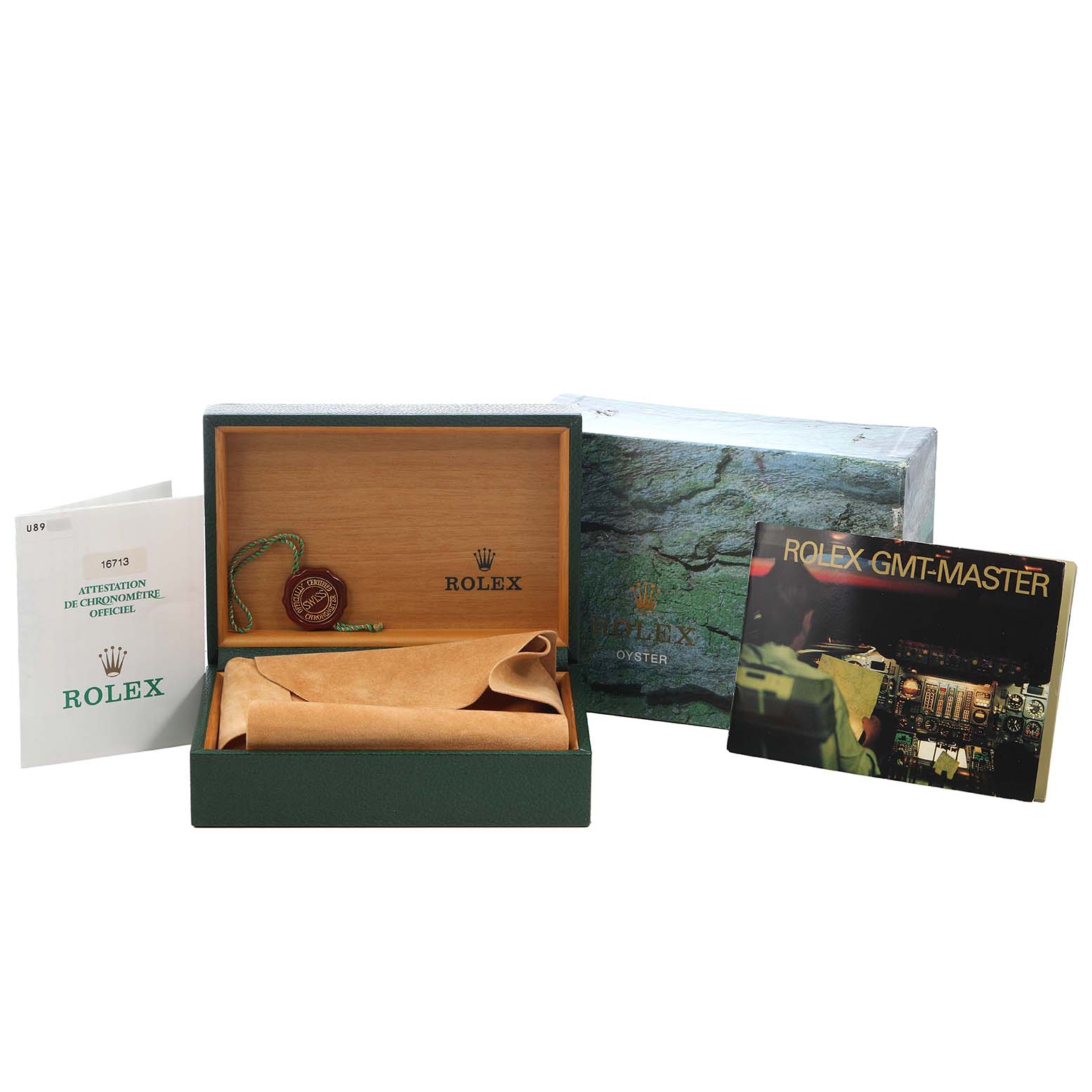 The image shows the packaging, wooden box, booklet, and tag from a Rolex GMT-Master 16713LN Men's Stainless Steel Black Dial watch set.
