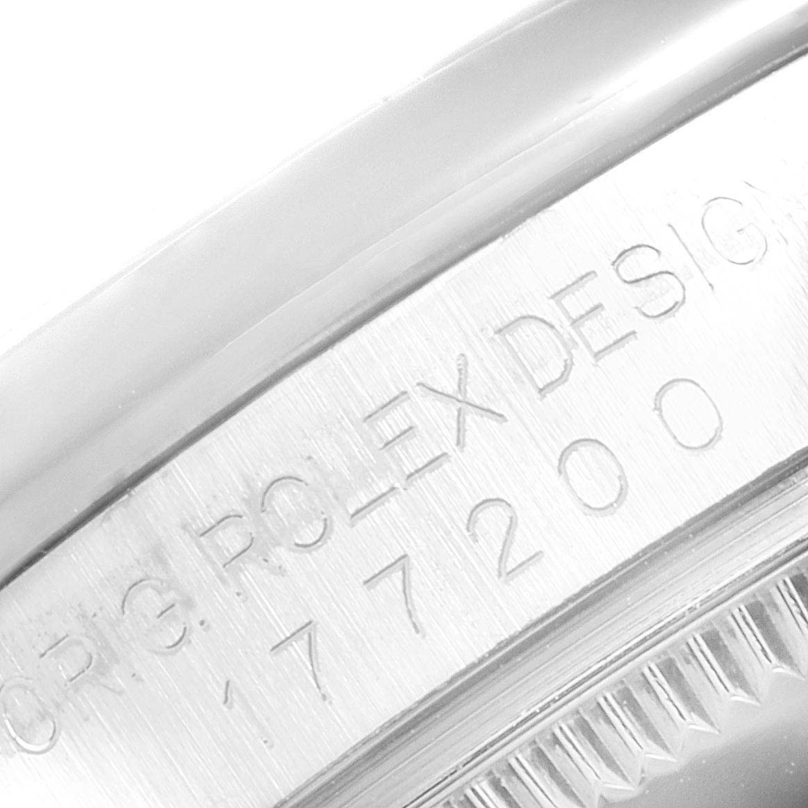 This image shows a close-up of the engraved serial and reference numbers on the case side of a Rolex Mid-Size 177200 Women
s Stainless Steel Pink Dial 177200 Women
s Stainless Steel Pink Dial watch.