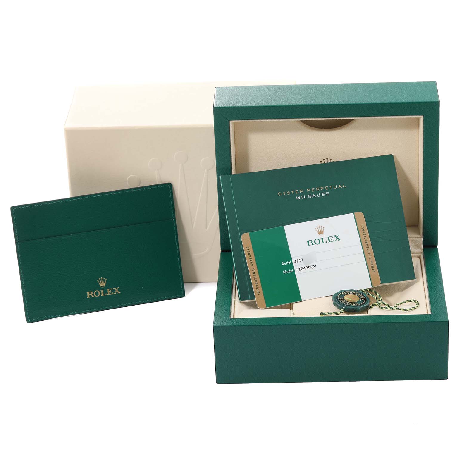 The image shows the packaging, warranty card, and cardholder for a Rolex Milgauss 116400GV Men's Stainless Steel Blue Dial 116400GV Men's Stainless Steel Blue Dial watch viewed from a front angle.