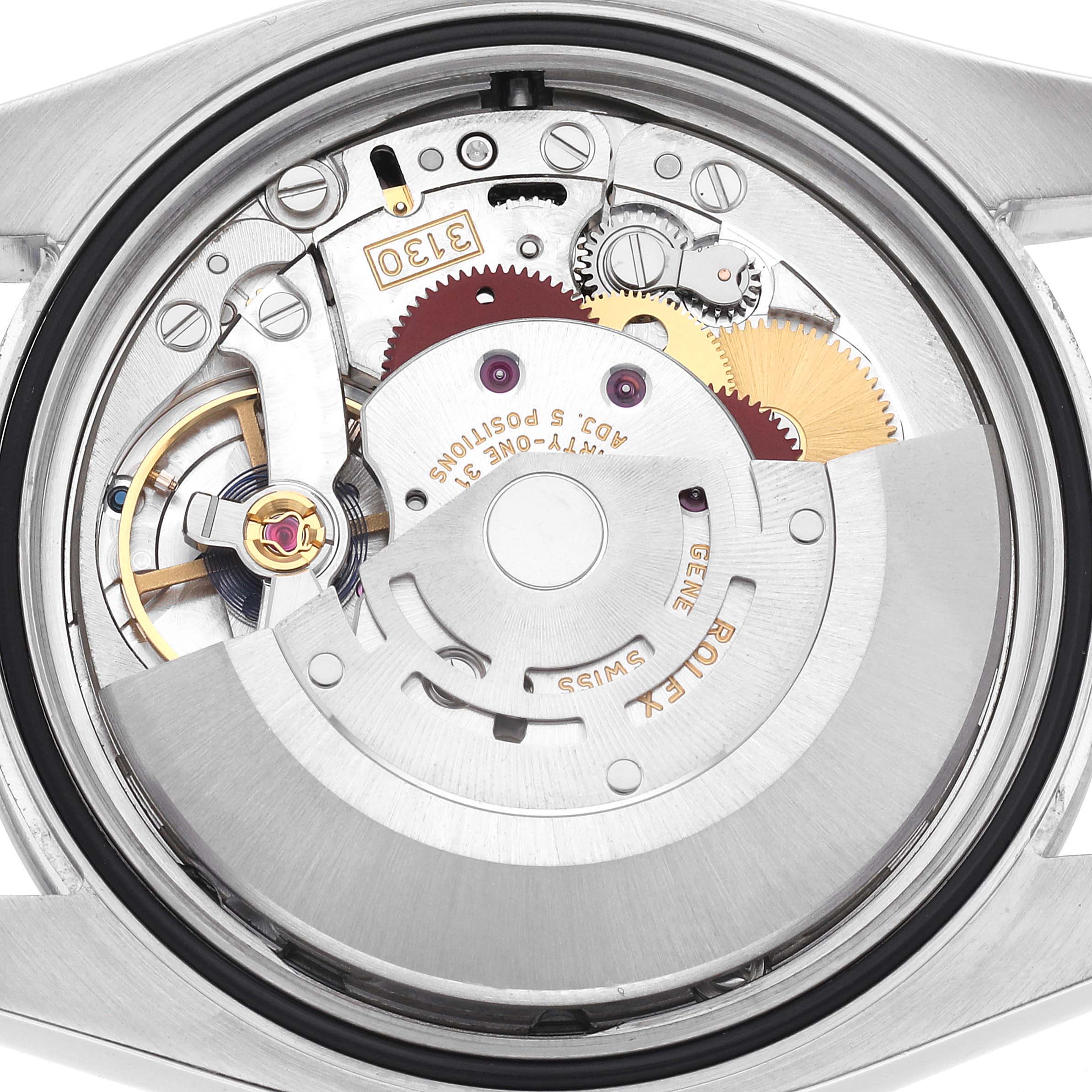 The image shows the internal mechanism and rotor of a Rolex Oyster Perpetual 116000 Men
s Stainless Steel Silver Dial 116000 Men
s Stainless Steel Silver Dial watch from the back view.