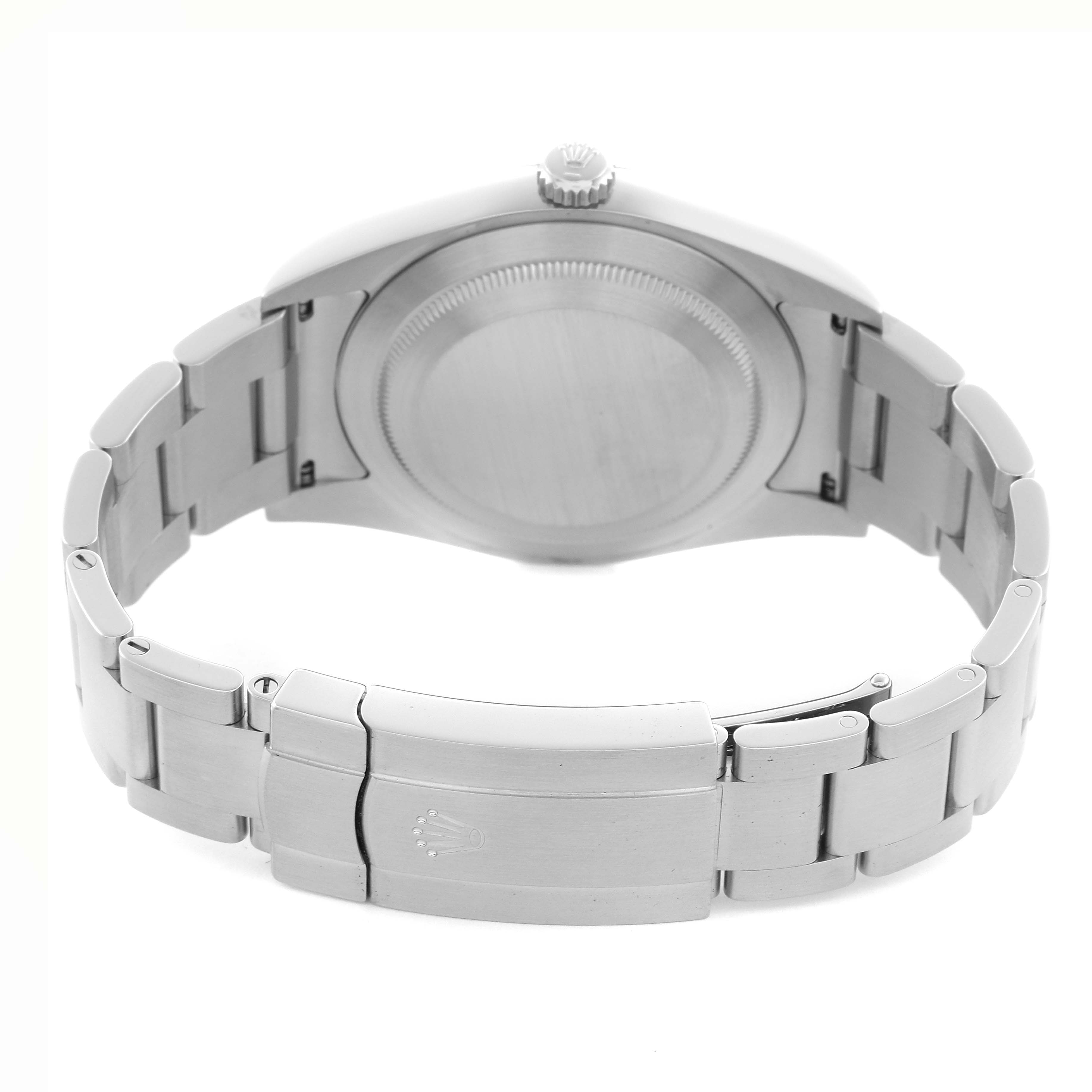 The image shows the back of a Rolex Oyster Perpetual 114300 Men
s Stainless Steel Blue Dial 114300 Men
s Stainless Steel Blue Dial watch, highlighting the clasp, links, and crown from a rear angle.