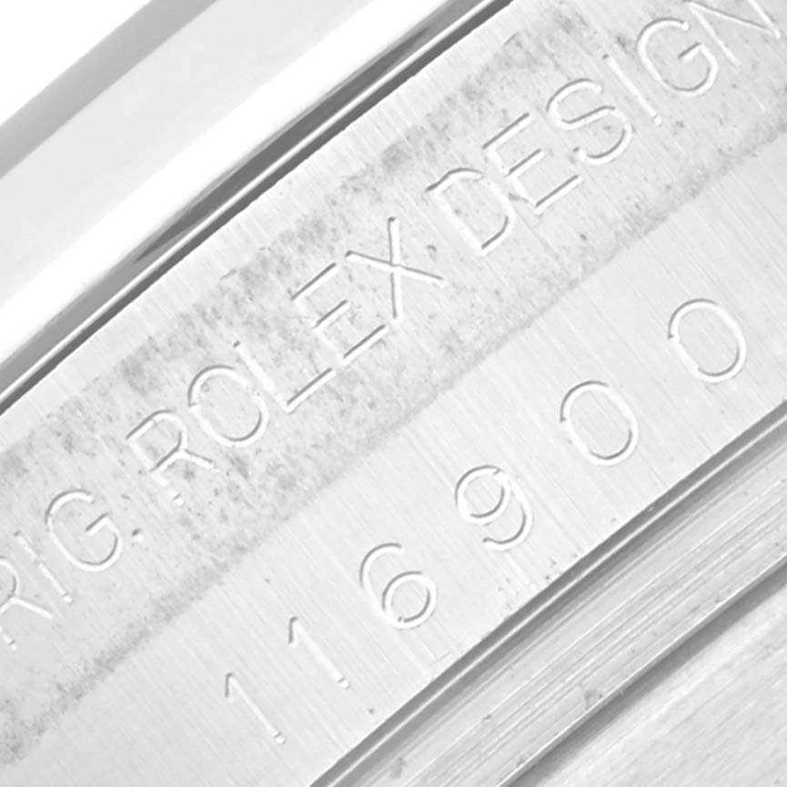 The image shows a close-up of the Rolex Air-King 116900 Men's Stainless Steel Black Dial 116900 Men's Stainless Steel Black Dial watch case with engraved text and model number.