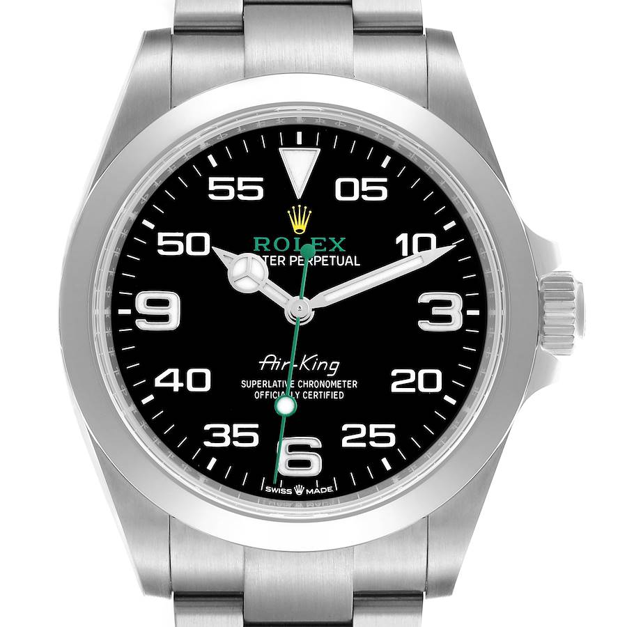 The Rolex Air-King watch is shown from a front angle, highlighting its black dial, silver markers, and stainless steel bracelet.