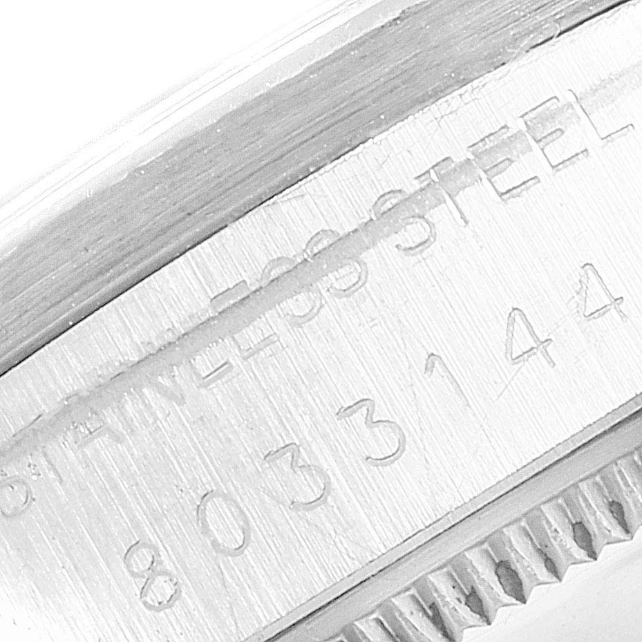 This image shows a close-up of the stainless steel casing and serial number on the Vintage Collection model by Rolex.