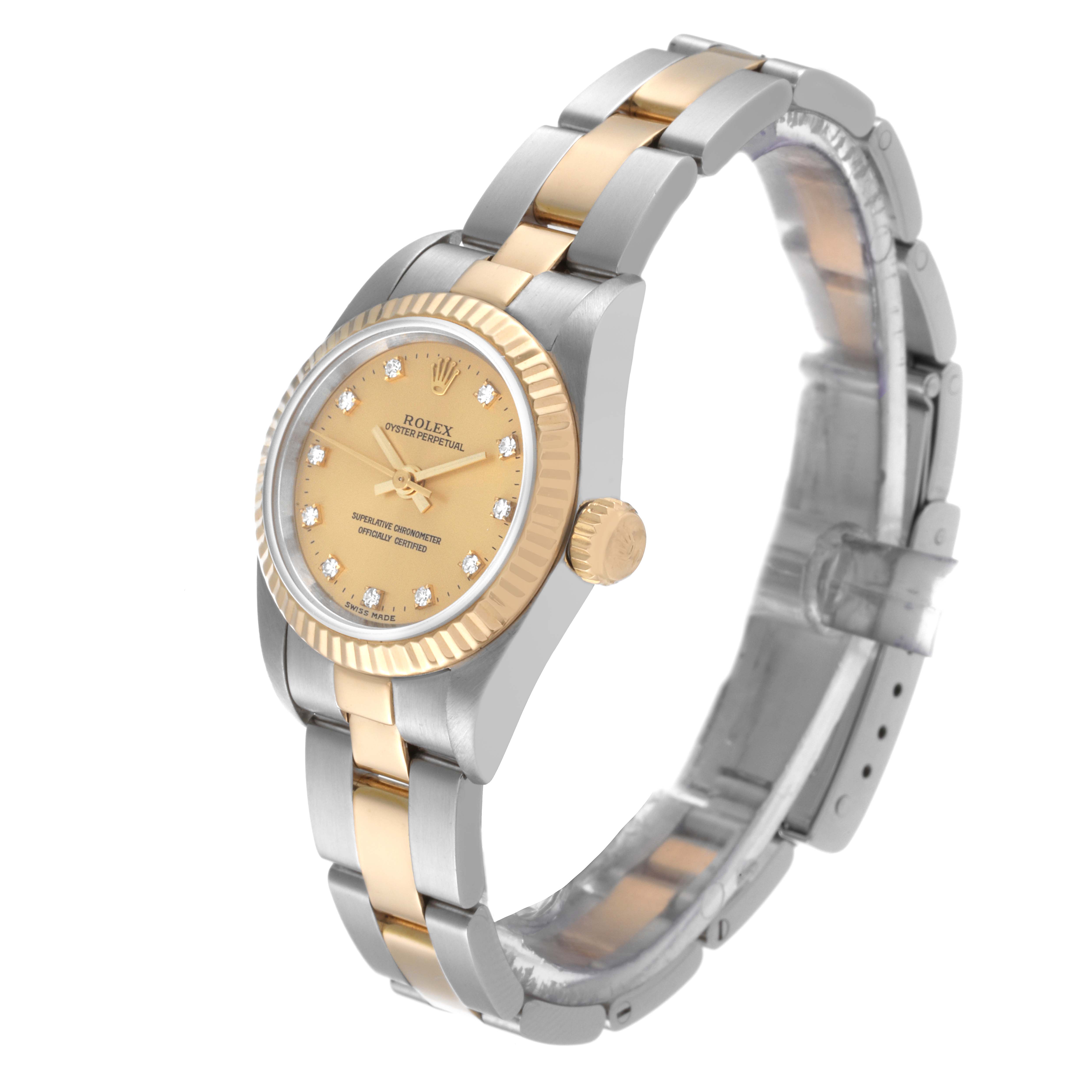 The Rolex Oyster Perpetual 76193 Women's Steel and Gold (two tone) Champagne Dial 76193 Women's Steel and Gold (two tone) Champagne Dial watch is shown at a slight angle, highlighting the face, crown, and two-tone bracelet.
