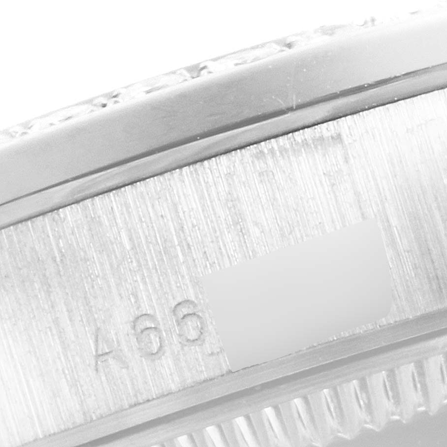 The image shows a close-up of the serial number engraving on the side of a Rolex President 78286 Women's Platinum Silver Dial 78286 Women's Platinum Silver Dial model watch case.