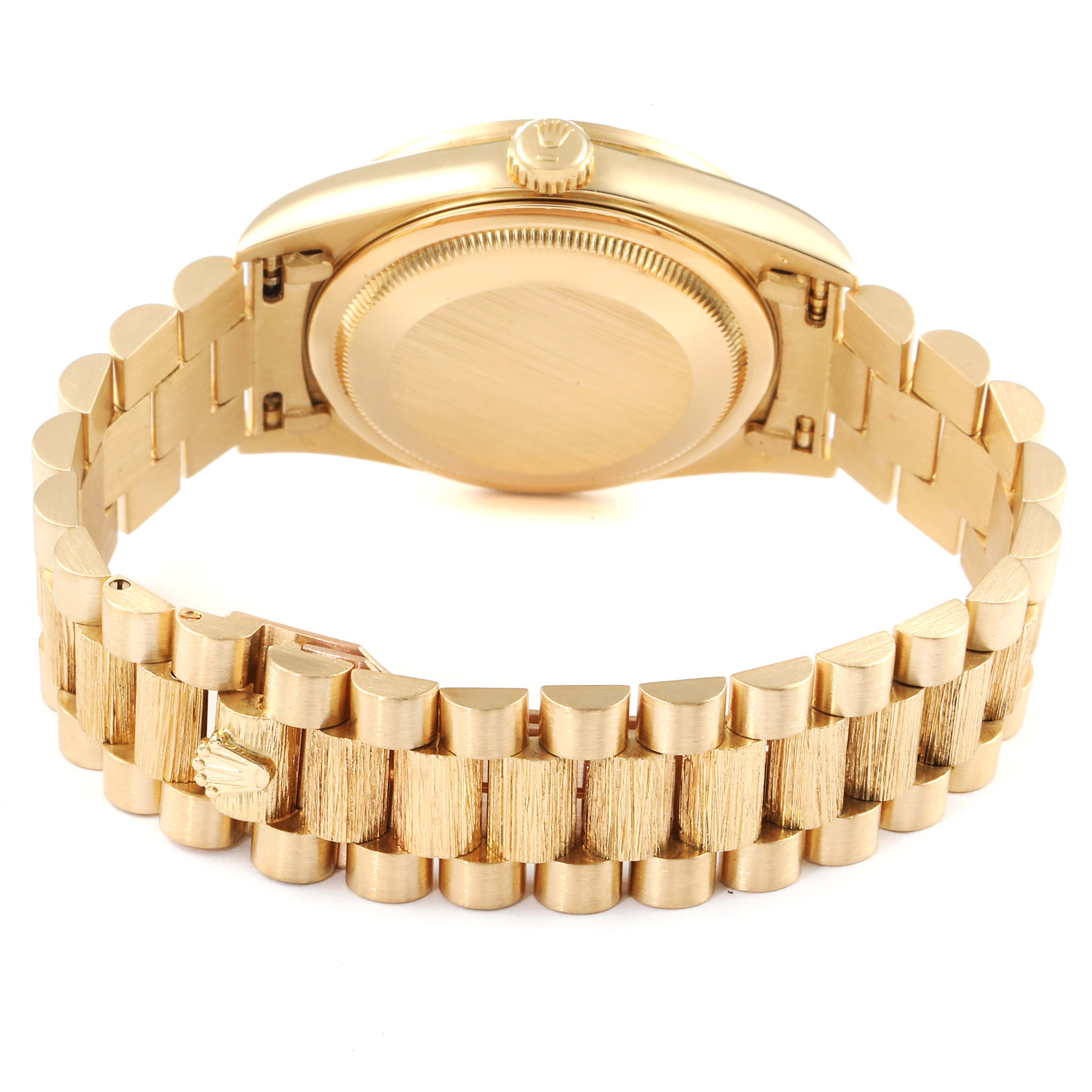 The image shows the backside and bracelet of a Rolex President 18308 Men's Yellow Gold Champagne Dial 18308 Men's Yellow Gold Champagne Dial model watch at a slight downward angle.