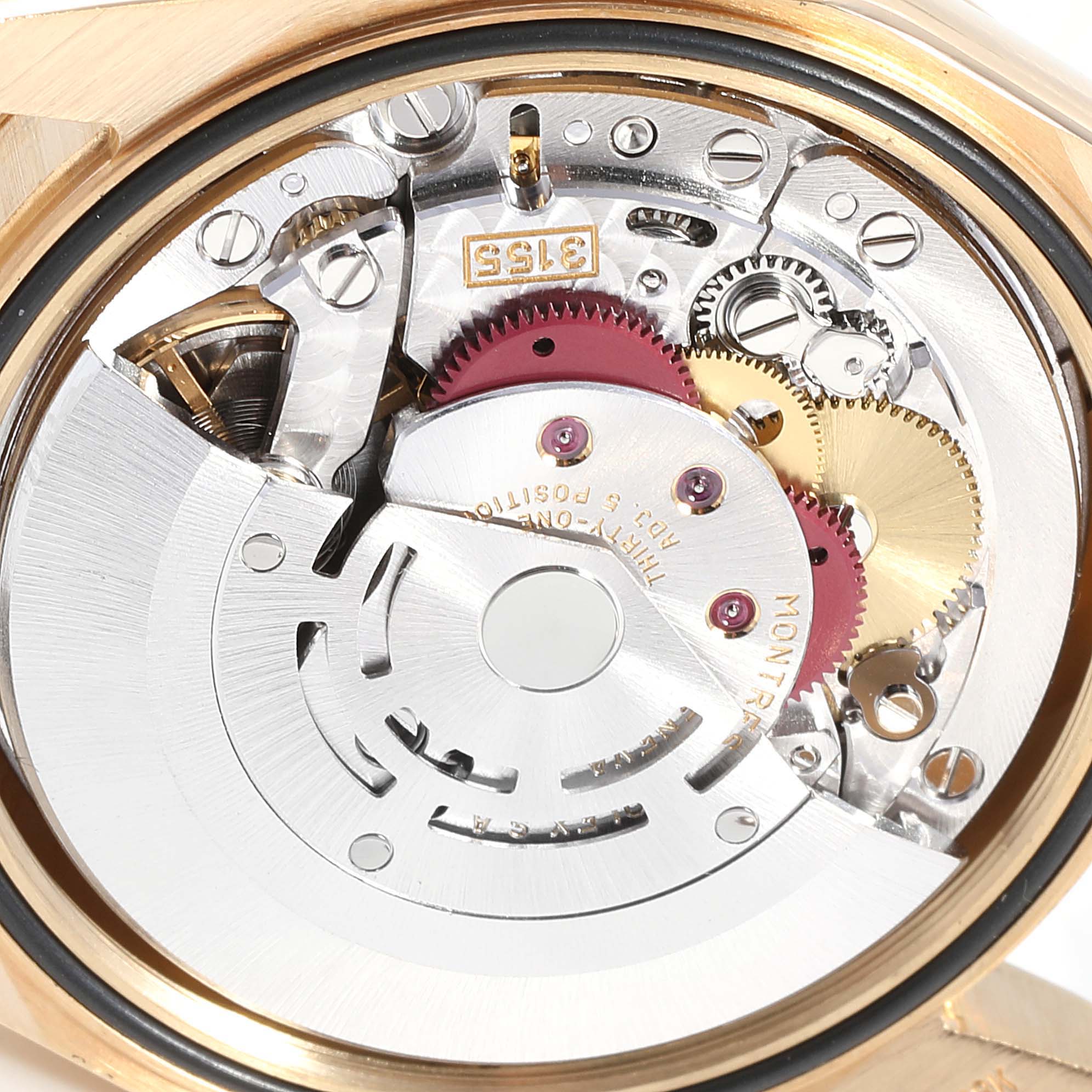 This image shows the detailed internal mechanism and movement of the Rolex President 118238 Men
s Yellow Gold Black Dial 118238 Men
s Yellow Gold Black Dial model watch from a close, top-down angle.